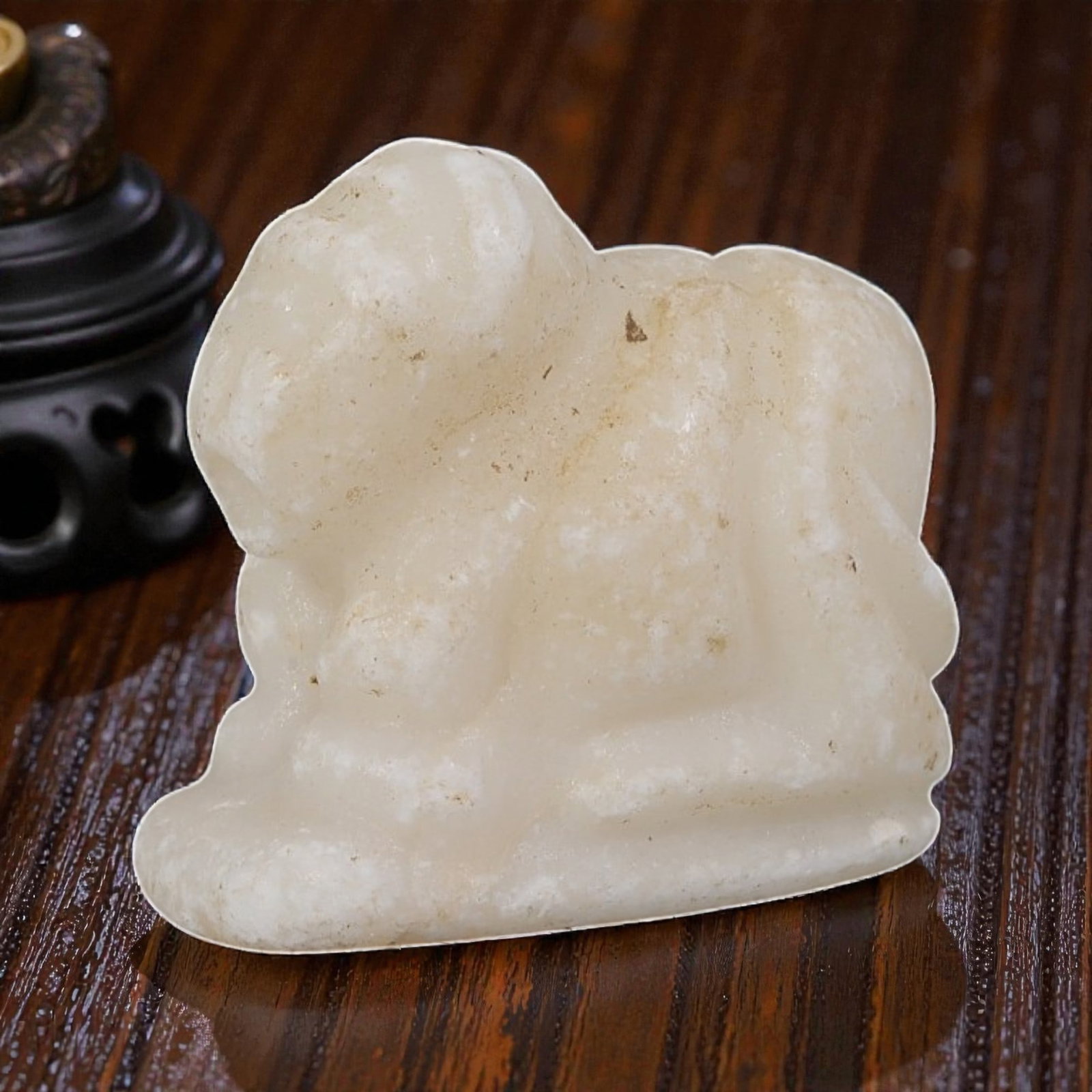 Ancient Bactrian Zoomorphic Marble Amulet, Circa 3rd-2nd Millennium BCE, 90YD: This ancient zoomorphic amulet is carved from pale, creamy marble, depicting a stylized recumbent quadruped in profile. The form features simplified anatomical contours, with minimal incised detailing