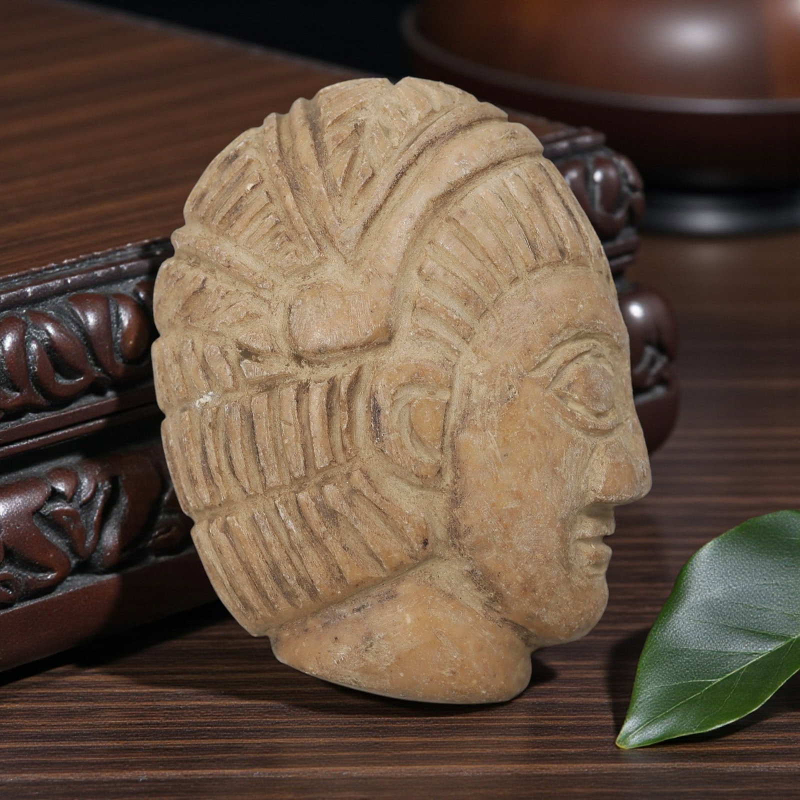 Antique Egyptian Steatite Intaglio with Profile Head Motif, 94YD: Carved from light tan steatite, this intaglio features a stylized human head in profile with deeply incised linear patterns representing the hairstyle, alongside defined facial features including almo