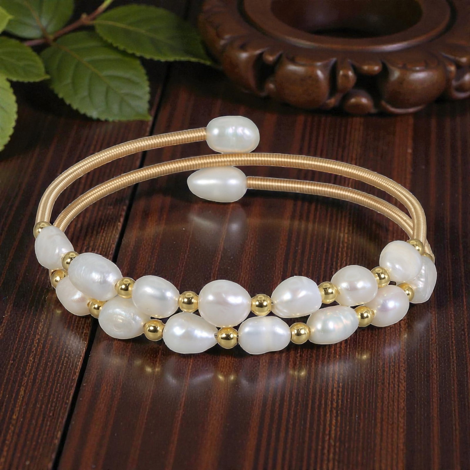 Natural Freshwater Pearl Gold Tone Double-Wire Open Cuff Bracelet, 30EB: A delicate open cuff bracelet crafted with gold tone double wire, featuring a lush arrangement of natural freshwater pearls interspersed with small gold tone spacer beads. The layered design creates a