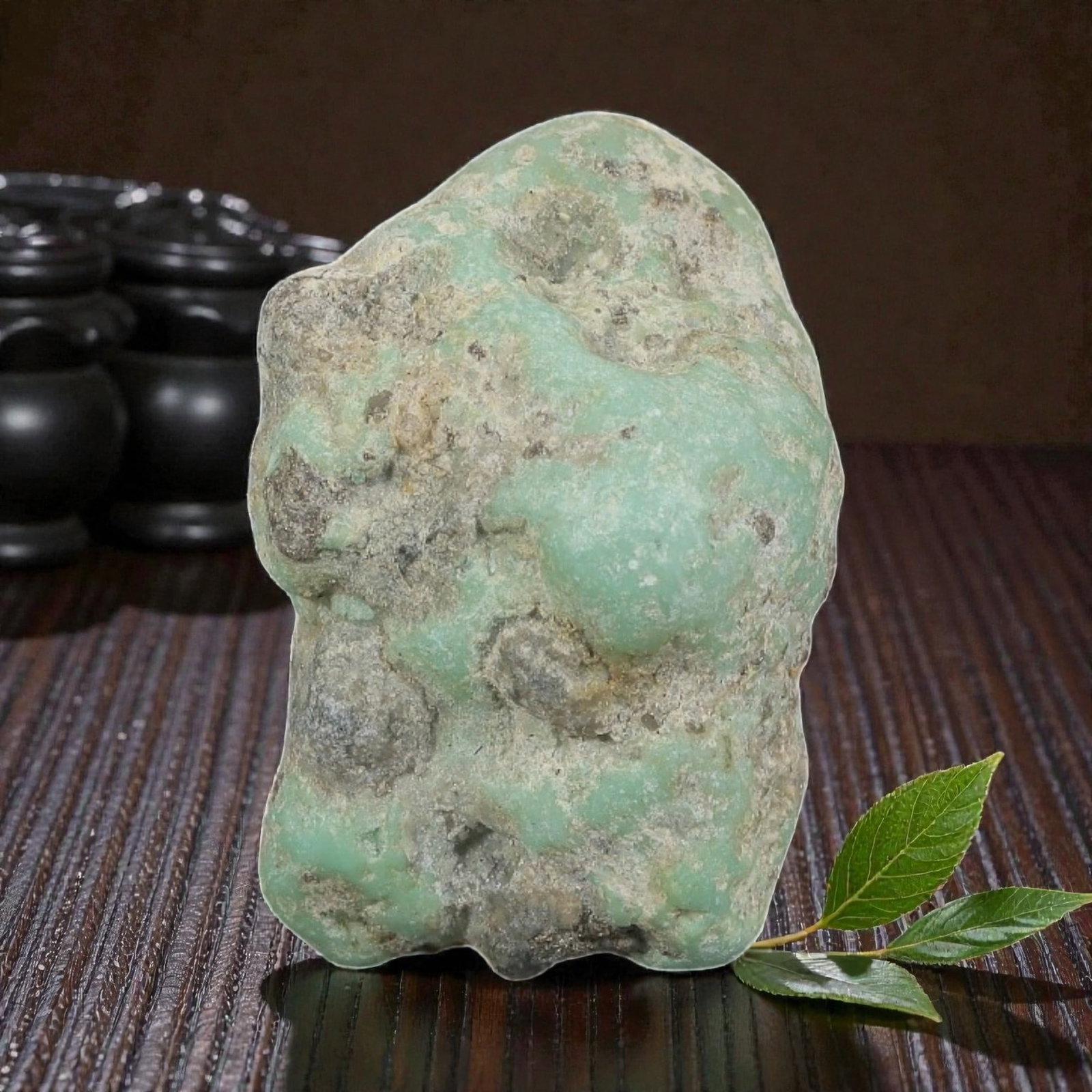 46ct Natural Kingman Turquoise Rough - Arizona USA, 42EB: This is a natural Kingman turquoise rough stone, measuring approximately 2.6x1.9cm with a total carat weight of 46ct. The stone features a soft light greenish-blue turquoise matrix, partially encased 