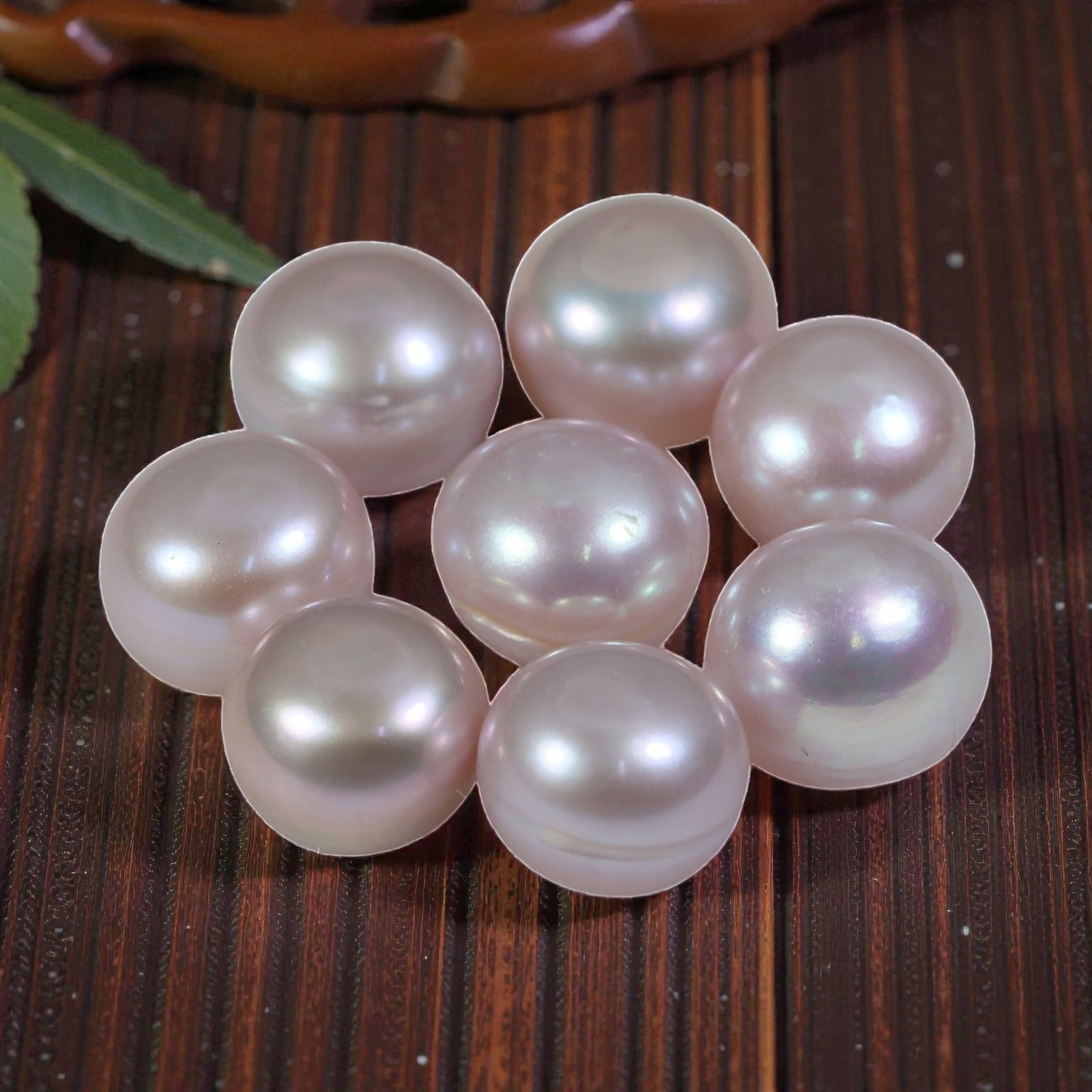 20.58ct Natural Fresh Water Pearl Drilled, 31YH: This is a drilled, natural freshwater pearl, showcasing a soft, silvery-pink hue with a smooth, polished surface and a luminous, iridescent luster. The pearl features a near-round shape with consisten