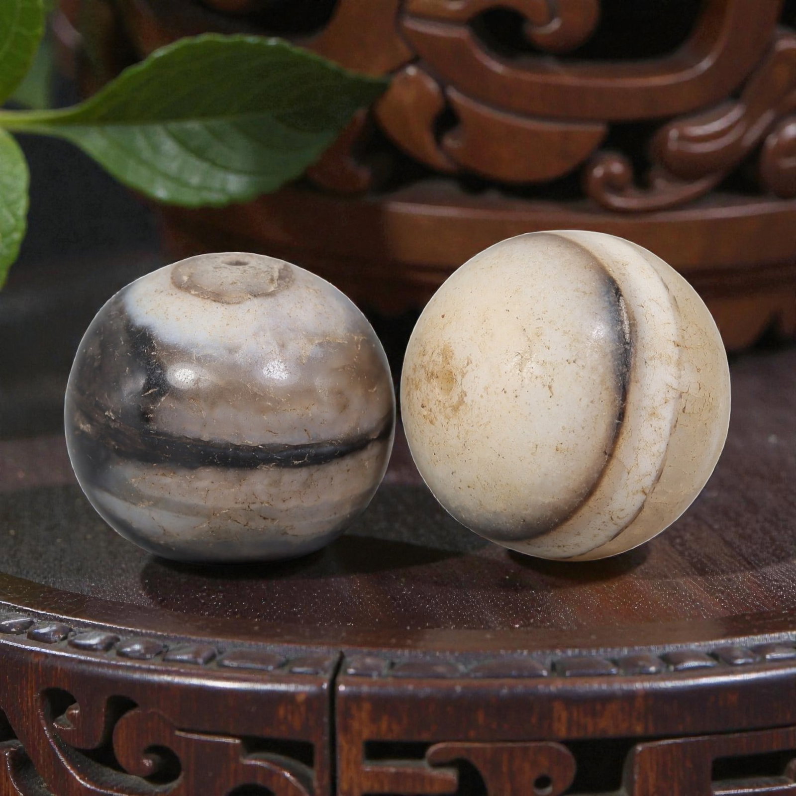 Antique Tibetan Agate Bead Pair - Banded Guru Dzi Beads, 56EB: These paired beads are crafted from natural banded agate, exhibiting distinct linear banding patterns in contrasting tones. The surfaces display fine cracking, patina, and smooth wear consistent with 