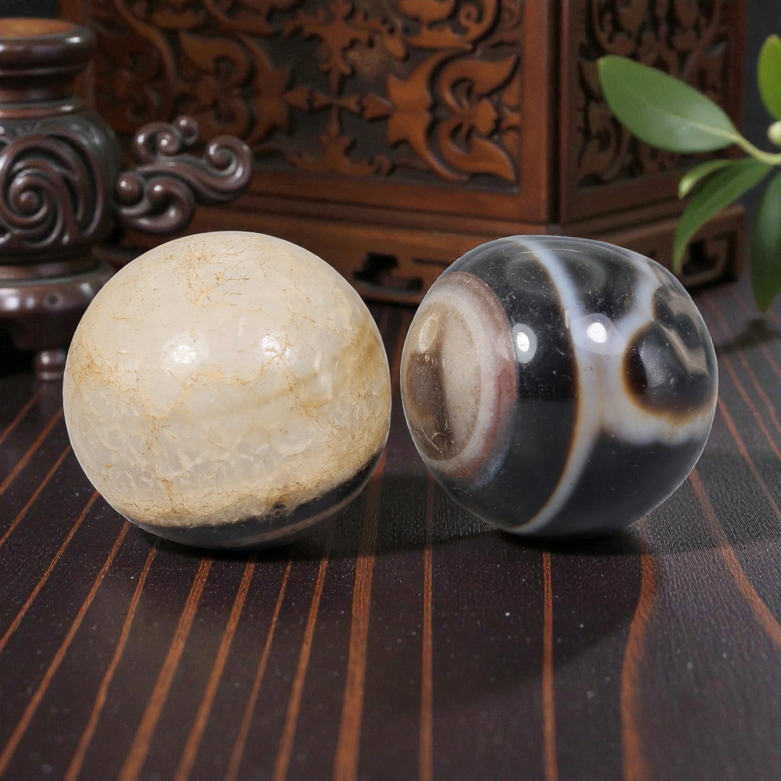 Antique Tibetan Agate Bead Pair - Banded Guru Dzi Beads, 58EB: These paired beads are crafted from natural banded agate, exhibiting distinct concentric and linear banding patterns. The surfaces display visible age-related patina and fine cracking consistent with 