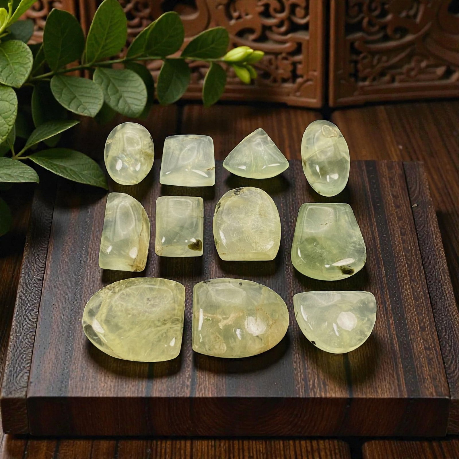 196 Carats Pale Green Prehnite Cabochon Parcel - Natural Malagasy Stones - 1.3-2.2cm, 69ZJ: This curated parcel of loose prehnite cabochons captivates with a soft, translucent pale green hue, each stone radiating a gentle, milky glow that evokes the quiet beauty of a forest stream. The inter
