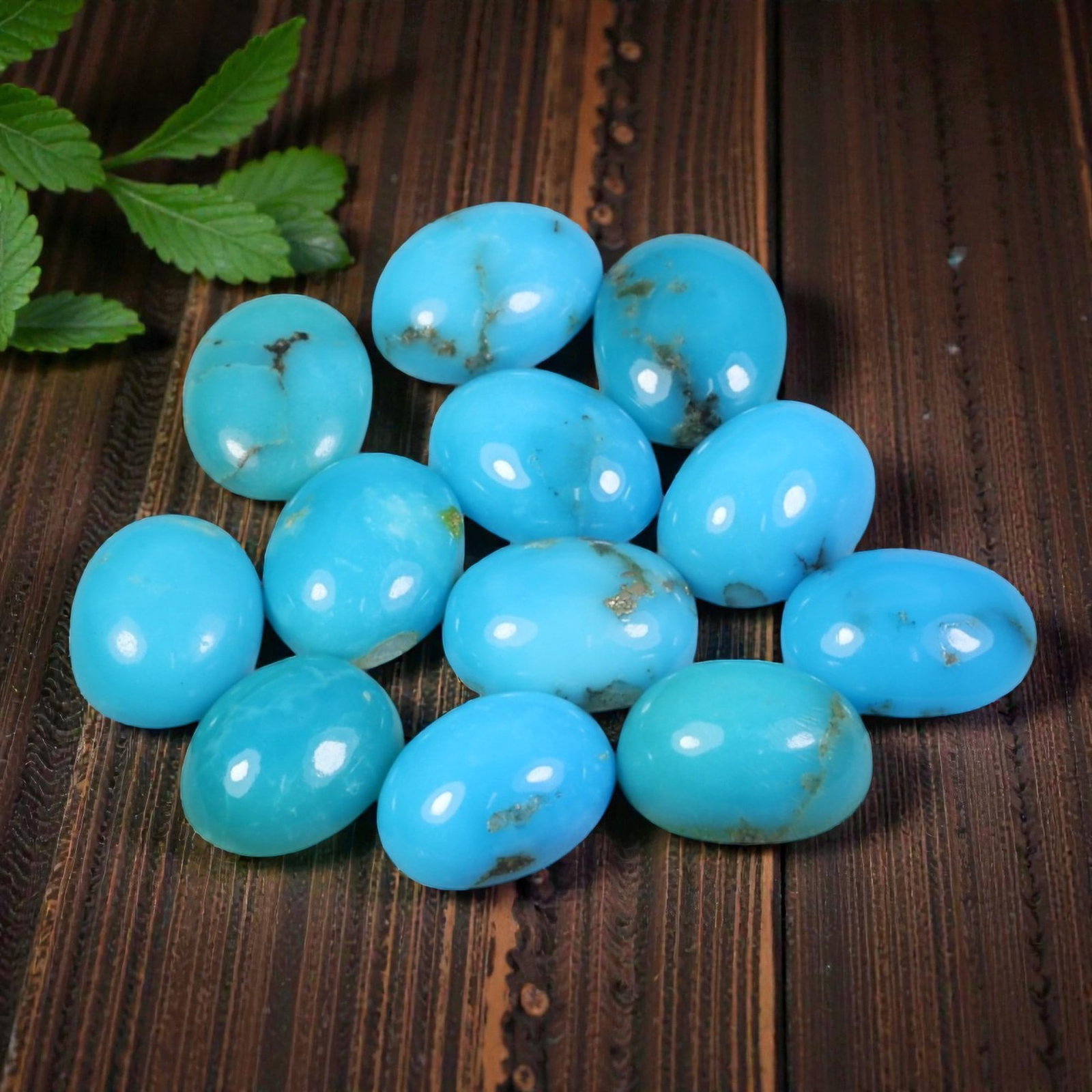 12.31 Carats Natural Turquoise - Oval Cabochon Gemstone, 100WE: Oval cabochon-cut turquoise gemstone, crafted from natural turquoise material. The stone displays a vivid sky-blue to turquoise coloration, with natural matrix inclusions, pyrite flecks, and subtle ve