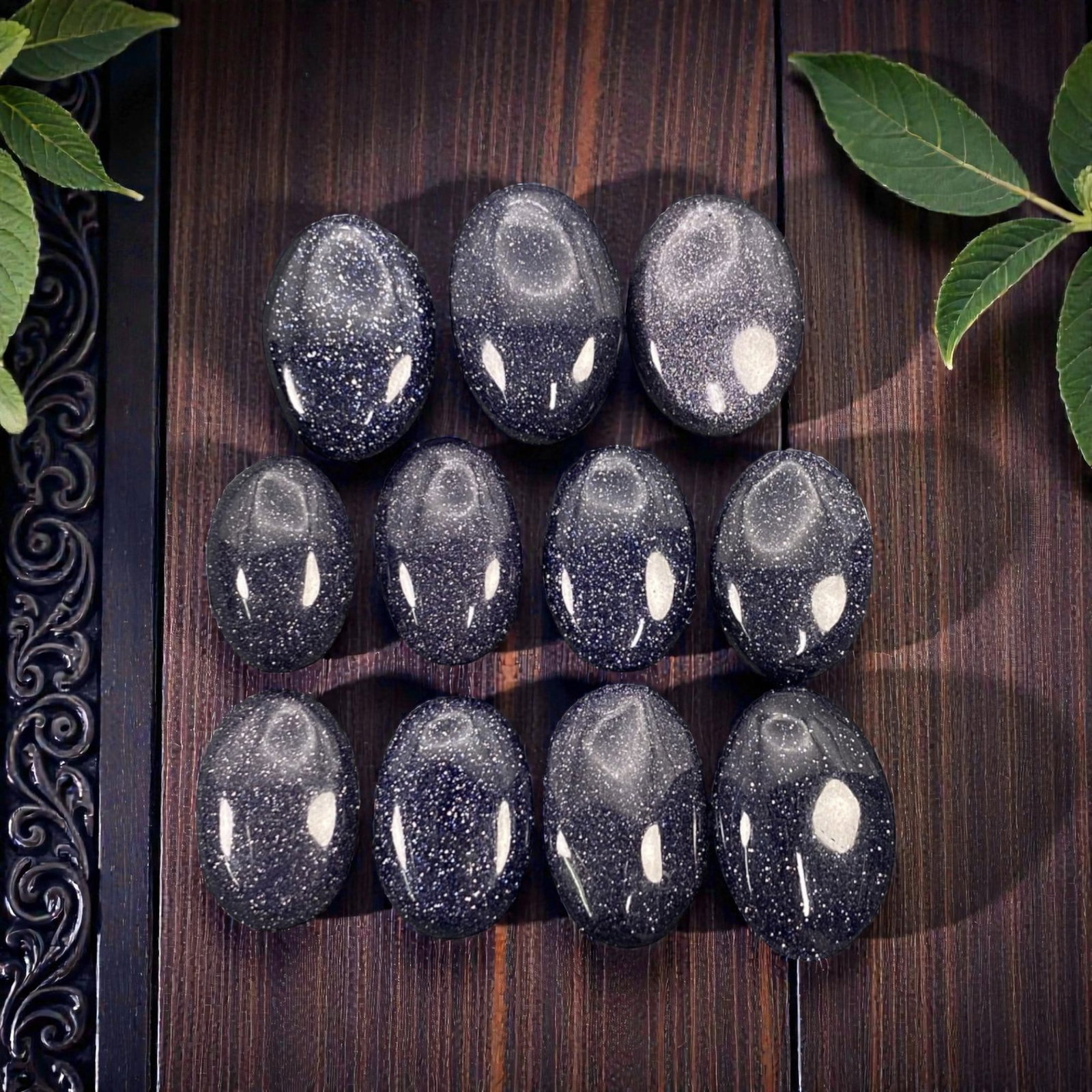 109.08 Carats Midnight Blue Goldstone Cabochon Parcel 1.7-2cm, 74ZJ: This luminous parcel of midnight blue goldstone cabochons shimmers with a celestial sparkle, evoking the quiet magic of a starry night sky. Each oval cabochon, sized between 1.7 and 2 centimeters, glo