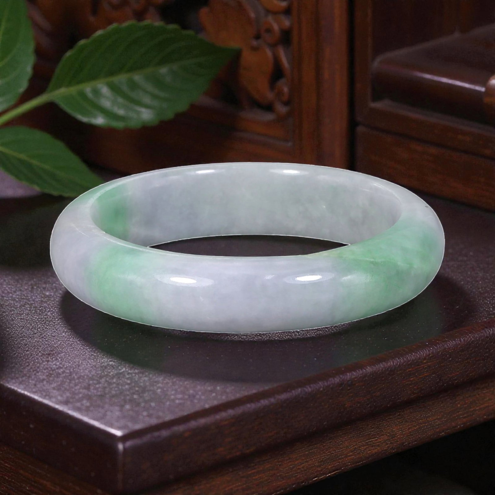 Natural Burmese Type A White & Green Jadeite Bangle - Bright Accent Bracelet, 12EA: This is a rounded, solid bangle crafted from natural Burmese Type A jadeite, displaying a clean milky-white base with vivid, bright green accents forming a striking two-tone pattern. The surface exhib