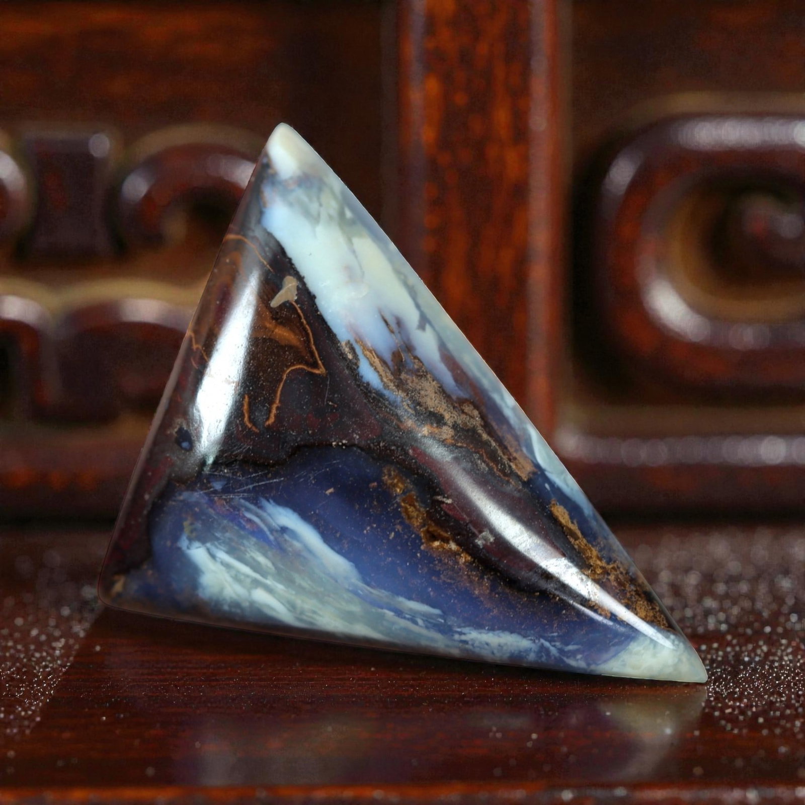 17.81 Carats Deep Blue and Brown Matrix Boulder Opal Cabochon - Natural Australian Stone, 41XM: This substantial boulder opal cabochon features a dramatic, layered composition of deep blue opal interwoven with rich brown and maroon ironstone matrix, accented by milky white opal veins that flow a