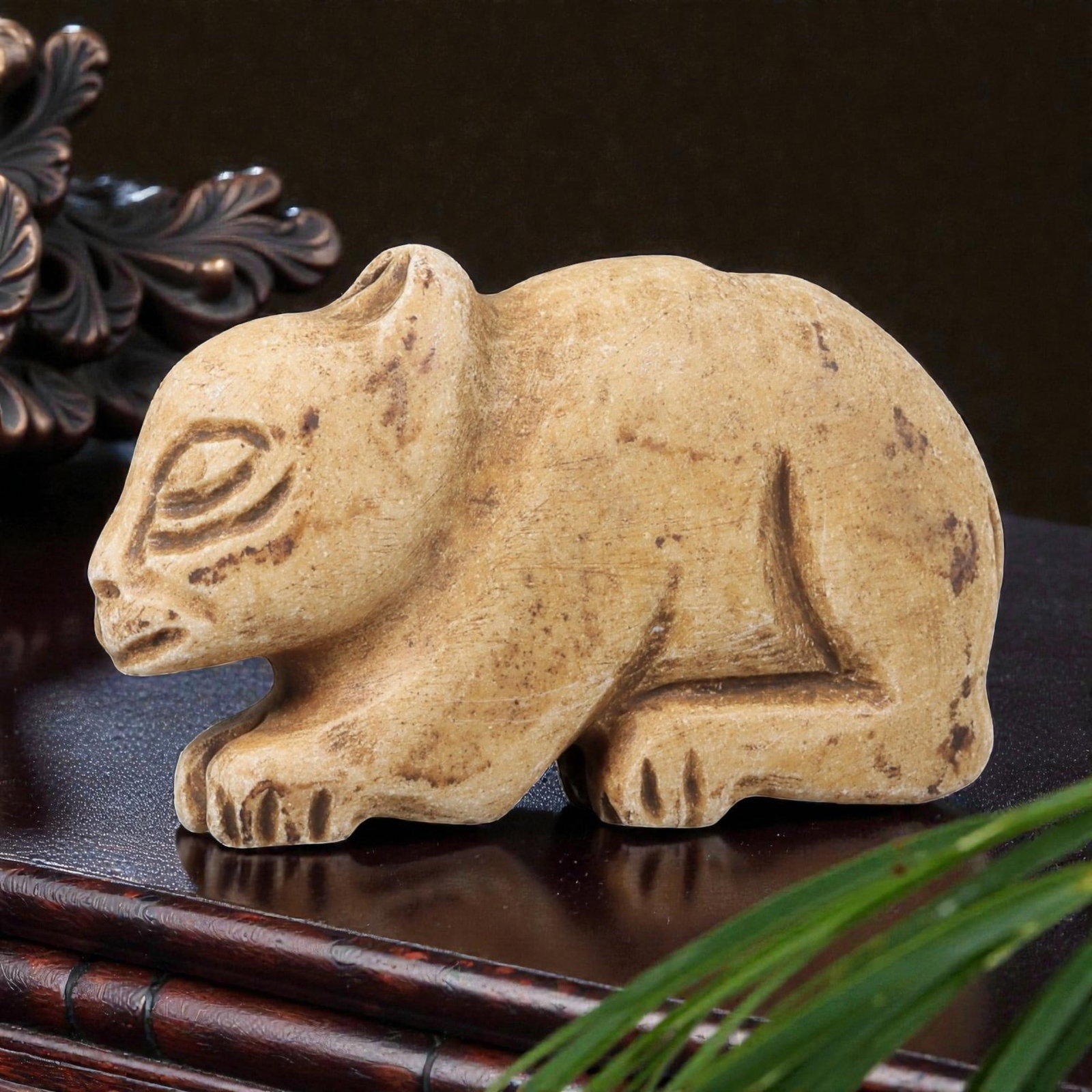 Ancient Stone Rodent Figurine - Near Eastern Animal Amulet, 64BF: Carved from a light tan stone with a naturally aged patina, this figurine depicts a stylized rodent in a crouched, forward-facing posture. The animal's form is rendered with expressive, rounded propor