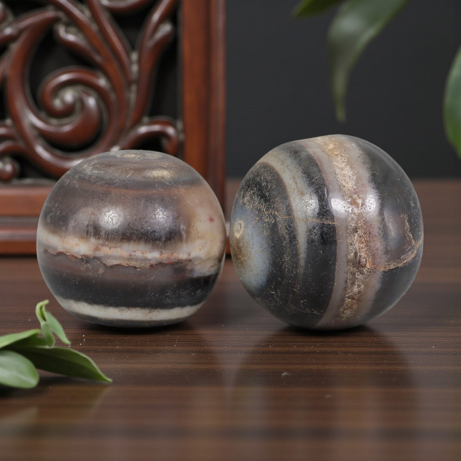 Antique Tibetan Agate Bead Pair - Banded Guru Dzi Beads, 55EB: These paired beads are crafted from natural banded agate, exhibiting distinct concentric striations and rich earthy tones. The surfaces show clear signs of age and wear, with patina and fine cracking 