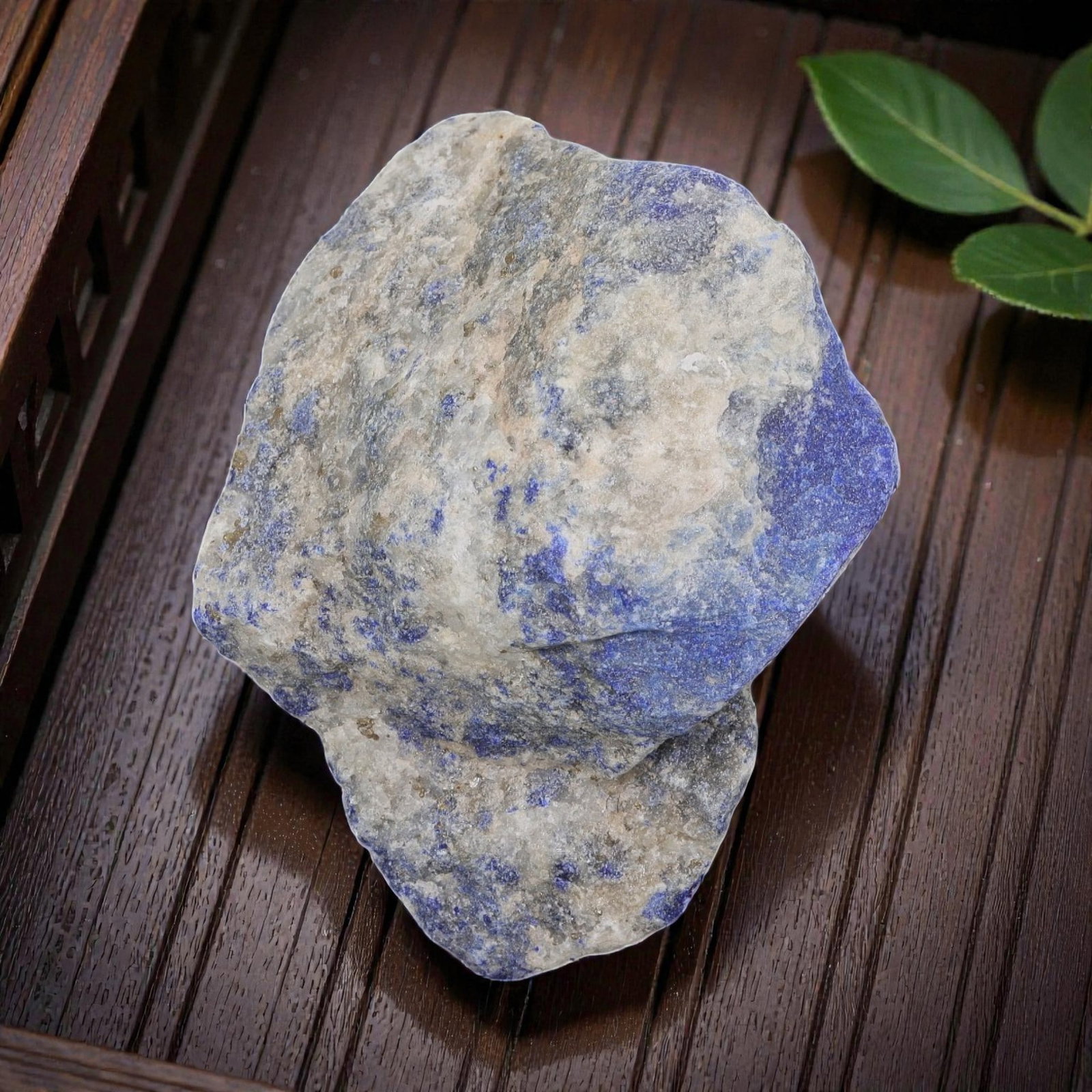 350 carats Natural Lapis Lazuli Rough, 45ZB: This is a natural, unpolished lapis lazuli rough specimen, exhibiting deep blue lazurite inclusions within a white calcite matrix, with minor pyrite flecks visible across the surface. The stone retain