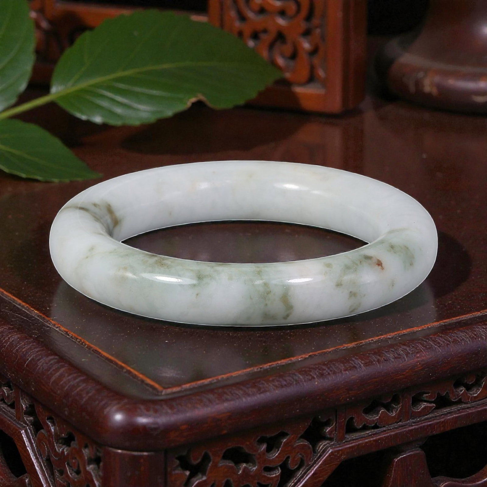 Natural Burmese Type A White & Green Jadeite Bangle - Soft Watercolor Bracelet, 27EA: This is a classic round-profile bangle crafted from natural Burmese Type A jadeite, displaying a creamy white base with soft, watercolor-style green and subtle earthy brown patterning throughout the p