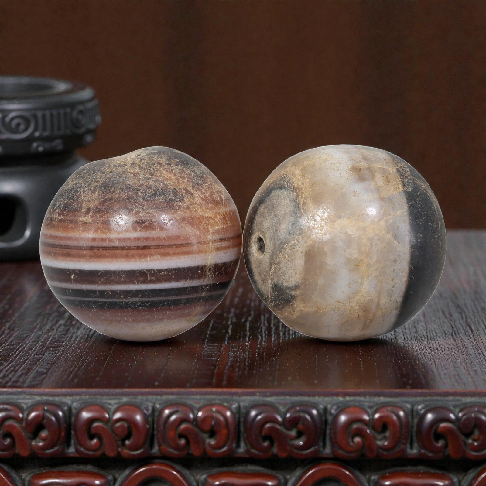Antique Tibetan Agate Bead Pair - Banded Guru Dzi Beads, 68EB: These paired beads are crafted from natural banded agate, exhibiting distinct concentric striations and contrasting earthy tonal variations. The surfaces display fine cracking, natural patina, and smo