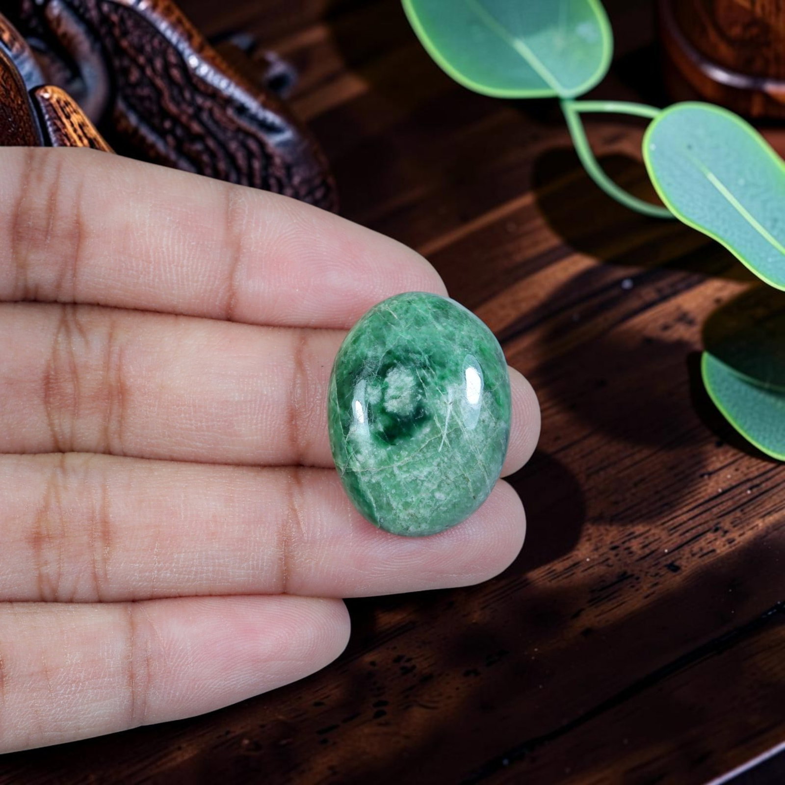 24.67ct Natural Burmese Type A Jadeite Jade Cabochon, 84EB: Polished from untreated natural Burmese Type A jadeite jade, this oval cabochon features smoothly domed top and flat base refined for custom jewelry setting. Its medium grass-green host matrix forms a