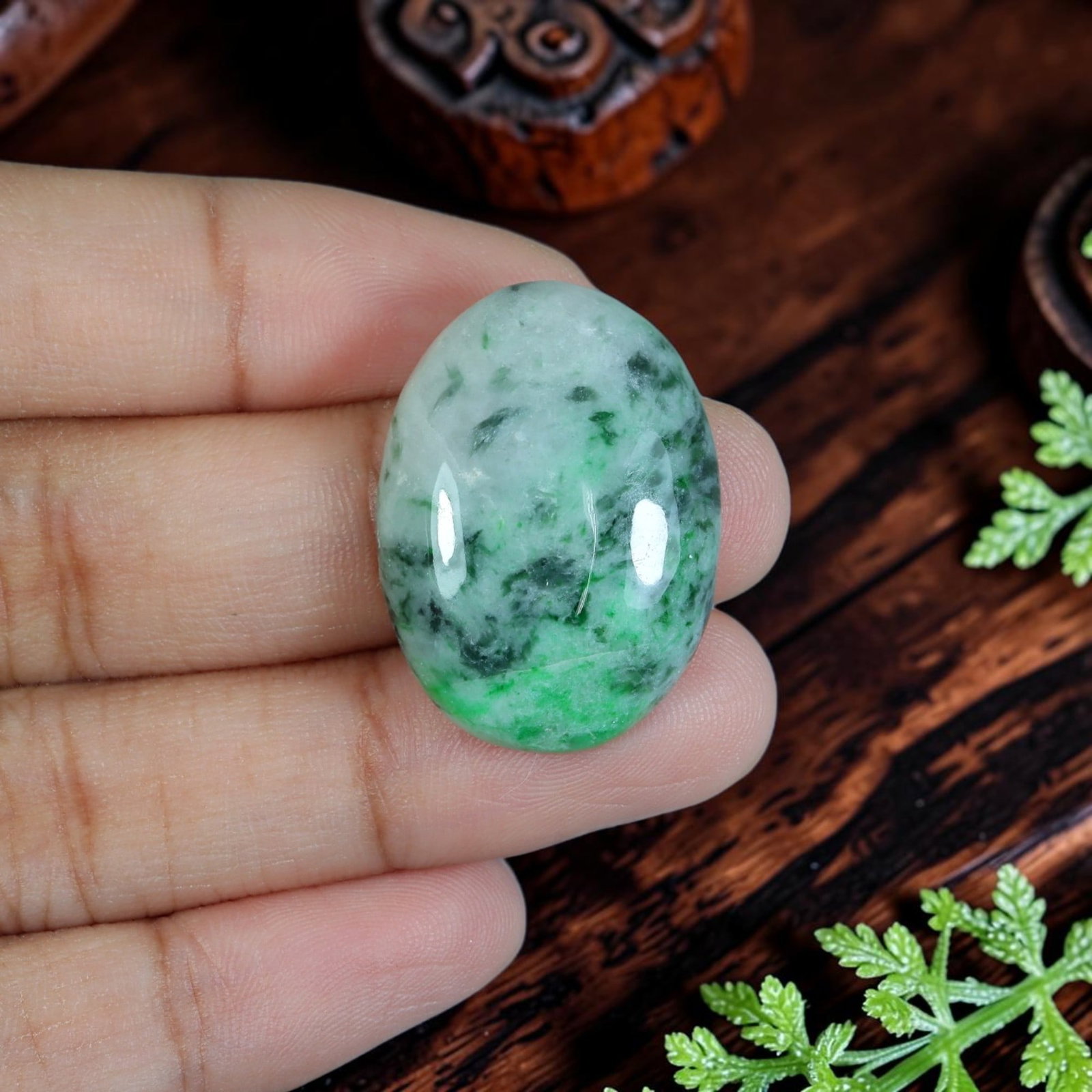 26.38ct Natural Burmese Type A Jadeite Jade Cabochon, 71EB: Formed from untreated natural Burmese Type A jadeite jade, this oval cabochon is precisely lapidary polished with a smoothly domed upper face and flat base designed for custom jewelry setting. The tra