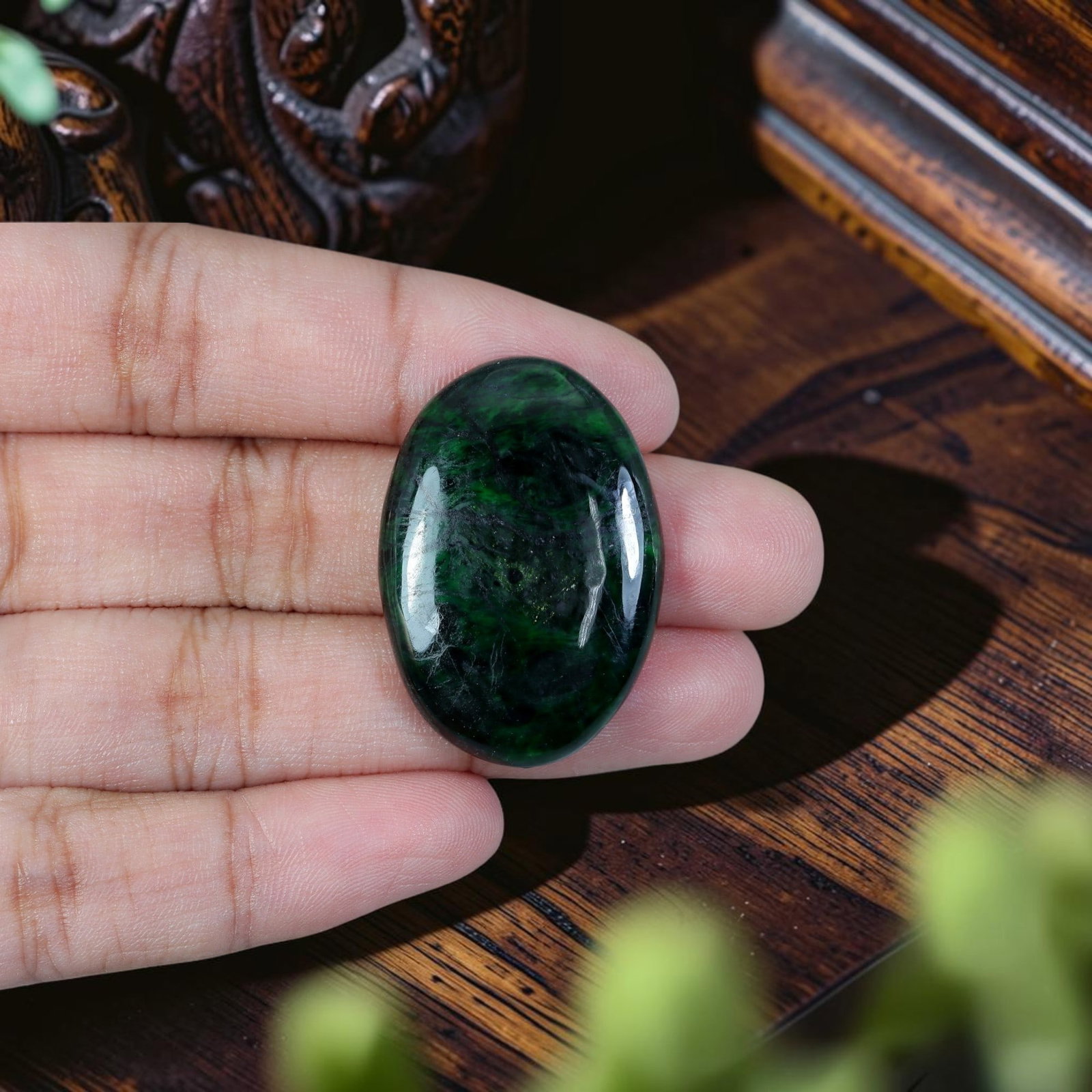 32.80ct Natural Burmese Type A Jadeite Jade Cabochon, 98EB: Polished from untreated natural Burmese Type A jadeite jade, this large plump domed oval cabochon features sleek high-gloss finish and flat base made for custom statement pendant mounting. Deep blacki
