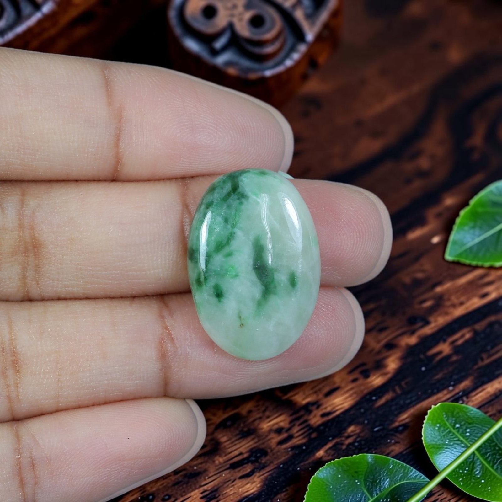 14.00ct Natural Burmese Type A Jadeite Jade Cabochon, 79EB: Cut from untreated natural Burmese Type A jadeite jade, this compact oval cabochon features refined glossy lapidary polish with domed upper face and slim flat base optimized for ring setting. Pale mil
