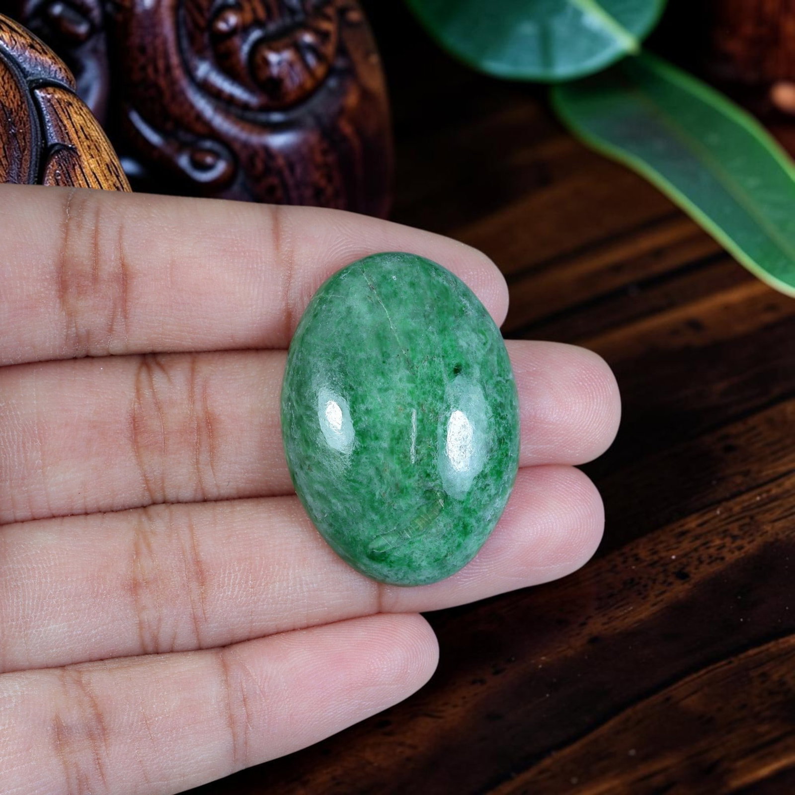 40.57ct Natural Burmese Type A Jadeite Jade Cabochon, 73EB: Polished from untreated natural Burmese Type A jadeite jade, this oversized high-domed oval cabochon features full glossy dome surface and thick flat base for heavy statement pendant mounting. Even sa