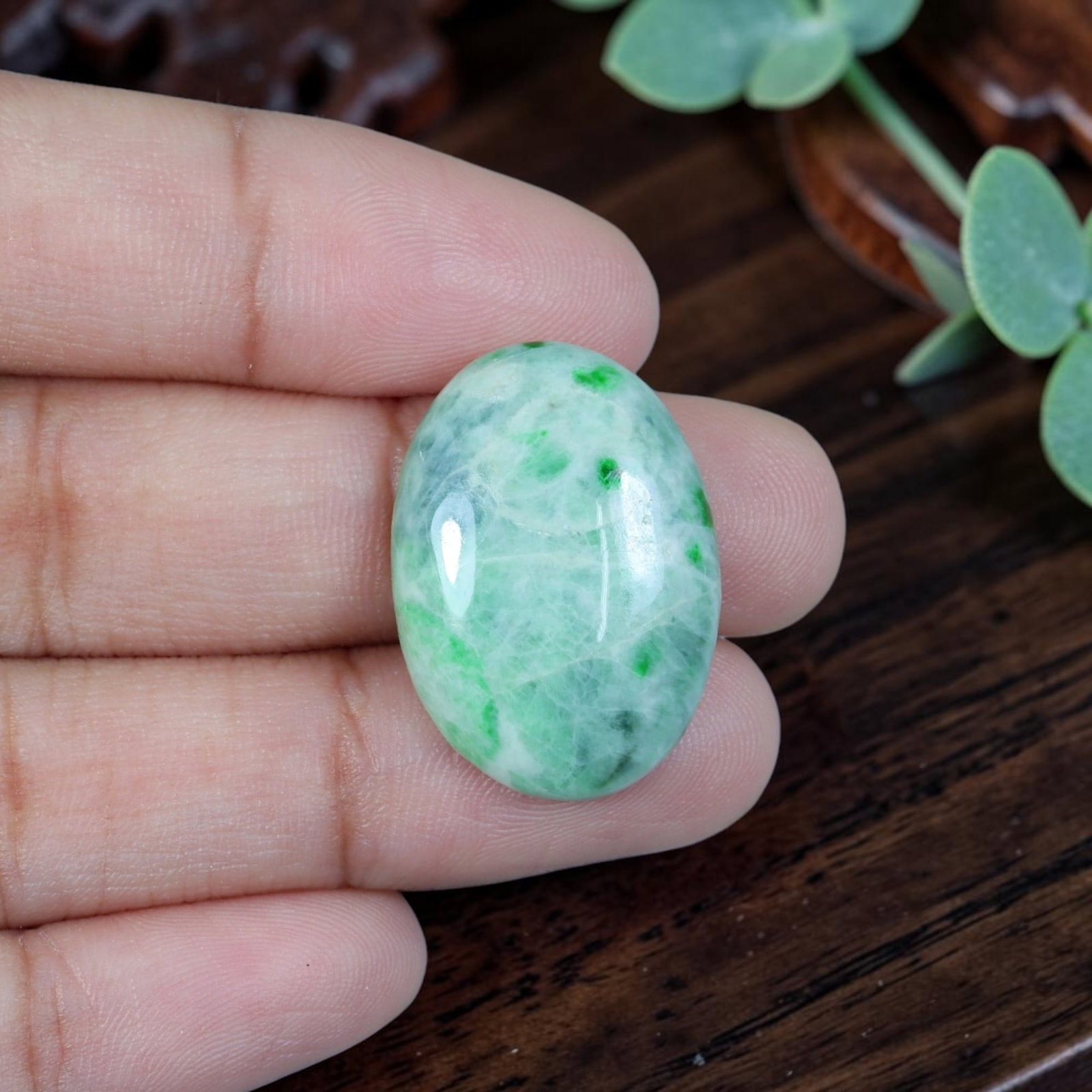 17.77ct Natural Burmese Type A Jadeite Jade Cabochon, 78EB: Polished from untreated natural Burmese Type A jadeite jade, this oval cabochon features smooth domed top and flat base made for ring or pendant jewelry setting. Pale translucent celadon base matrix i