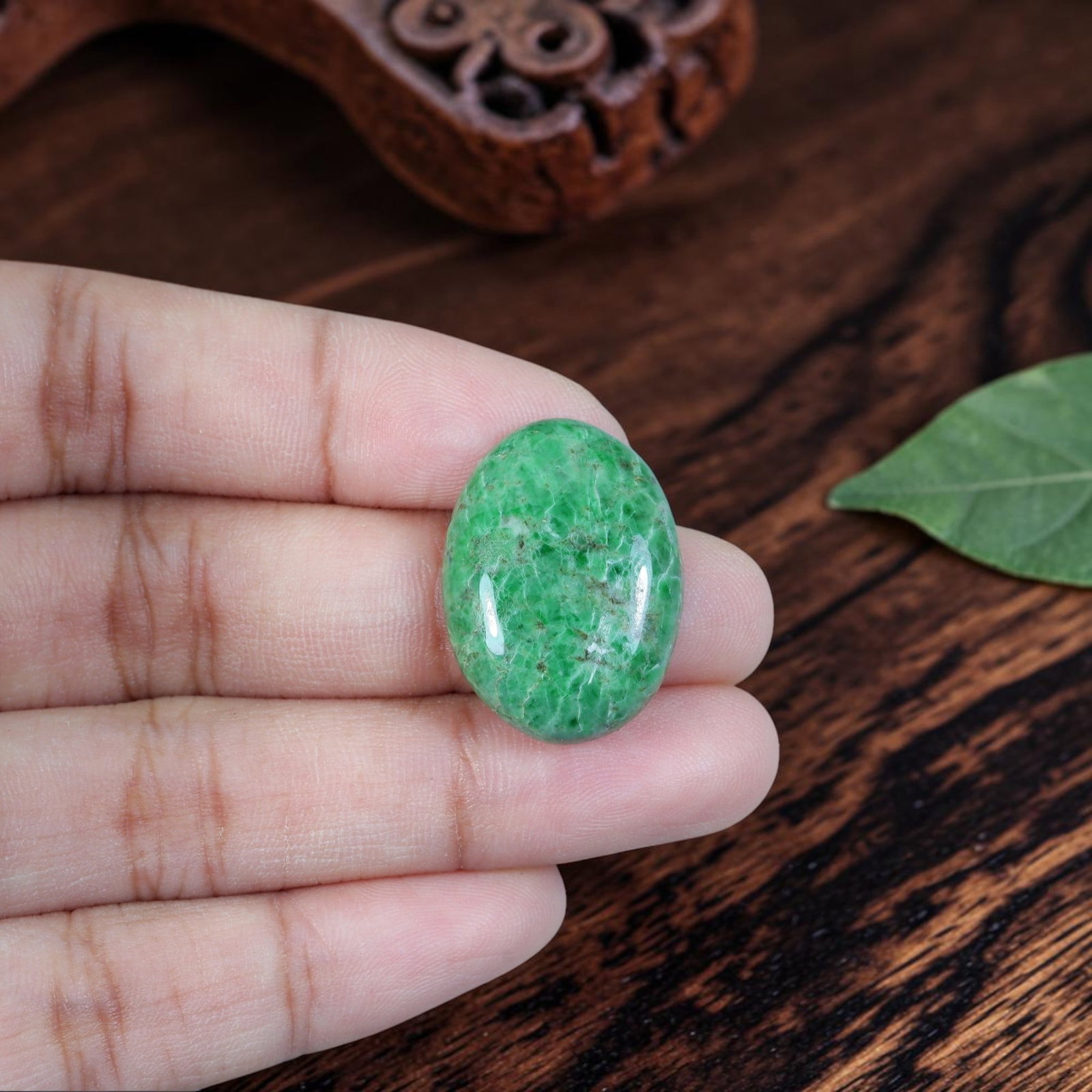 18.52ct Natural Burmese Type A Jadeite Jade Cabochon, 85EB: Polished from untreated natural Burmese Type A jadeite jade, this mid-sized oval cabochon features plump domed glossy surface and flat base ideal for ring or petite pendant setting. Rich saturated eme