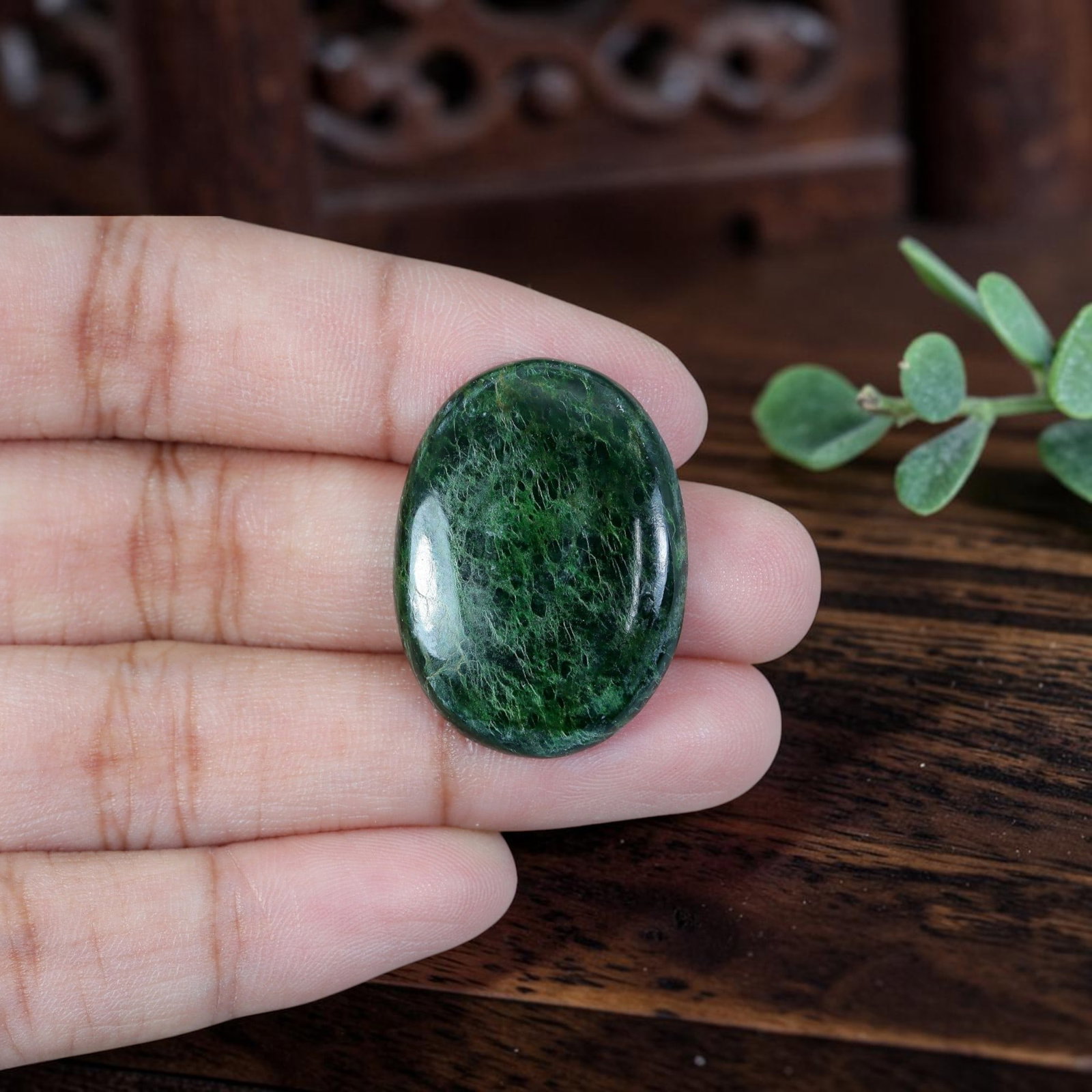 20.04ct Natural Burmese Type A Jadeite Jade Cabochon, 4EC: Fabricated from untreated natural Burmese Type A jadeite jade, this large oval cabochon is refined with glossy lapidary polish featuring a rounded domed face and flat base suited for bespoke pendant m