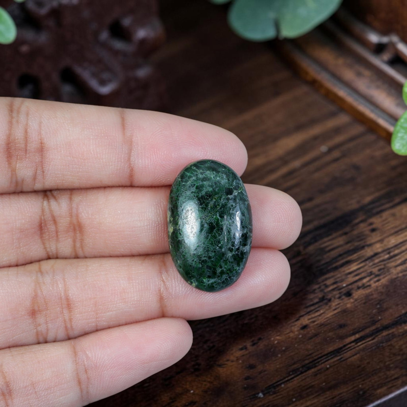 16.78ct Natural Burmese Type A Jadeite Jade Cabochon, 9EC: Polished from untreated natural Burmese Type A jadeite jade, this thick domed oval cabochon features high glossy finish and flat base for ring or pendant setting. Deep forest moss green main body is p