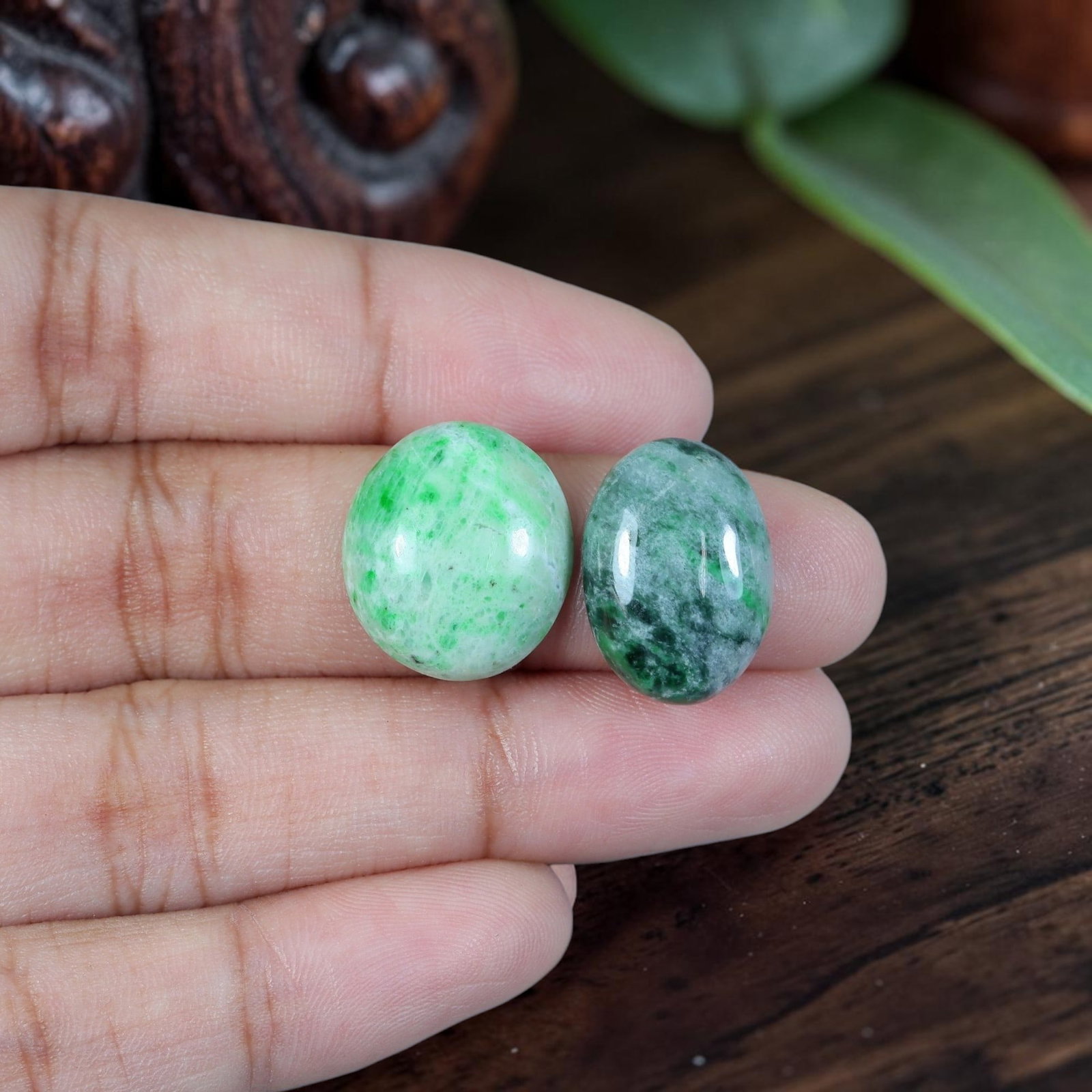 15.02ct Natural Burmese Type A Jadeite Jade Cabochon Pair, 13EC: Cut from untreated natural Burmese Type A jadeite jade, this matched pair of oval cabochons receives fine lapidary polish with rounded domed tops and flat bases tailored for earring mounting. The set 