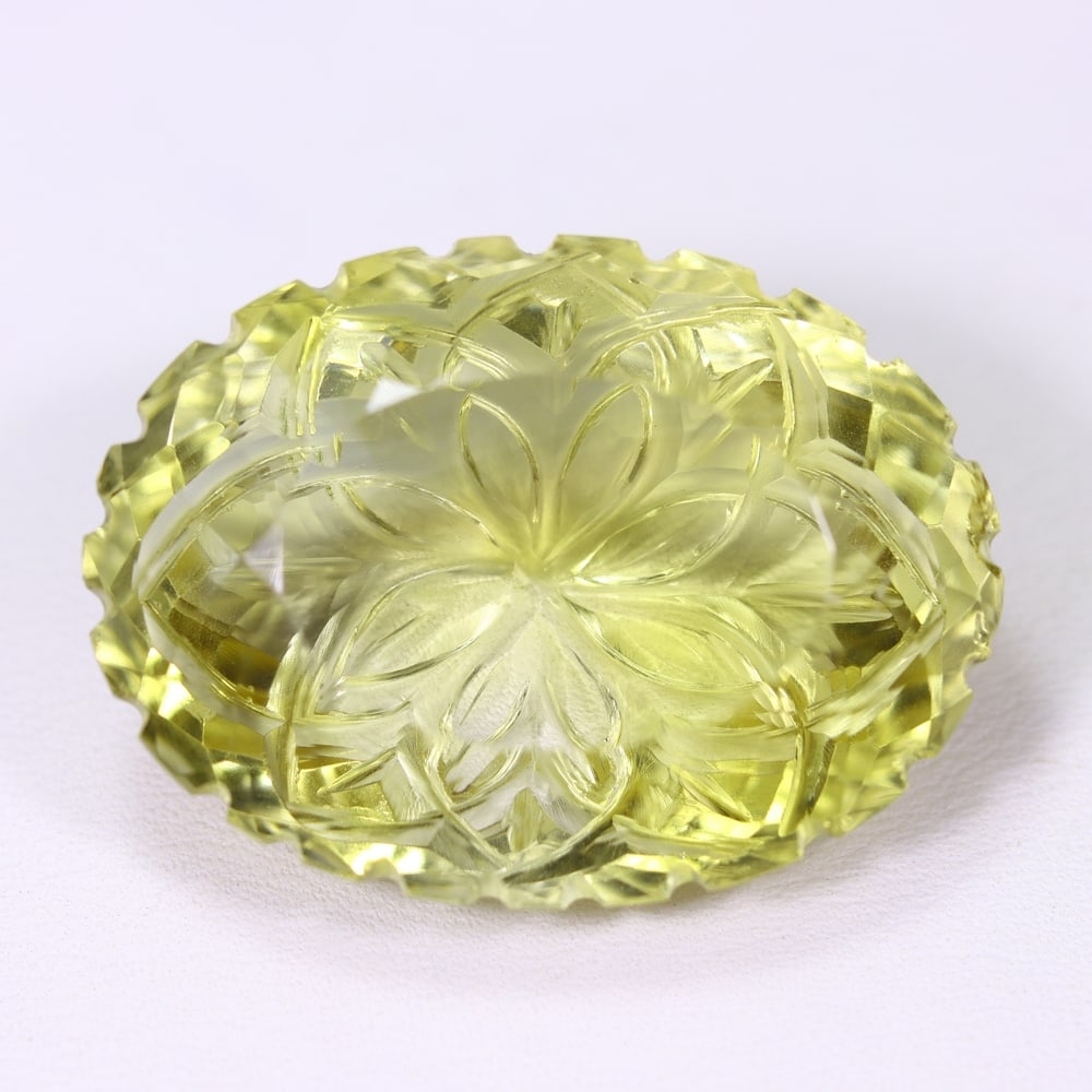 71.63Ct Lemon Carving Quartz - Polished Carving, 16B: Ksmith Heritage Auctioneers Subject: Natural Lemon Quartz Origin: Brazil Carat Weight: 71.63Ct Dimension: 33.4x24.5x14.1 mm Treatment: Untreated Type: Carving, Polished