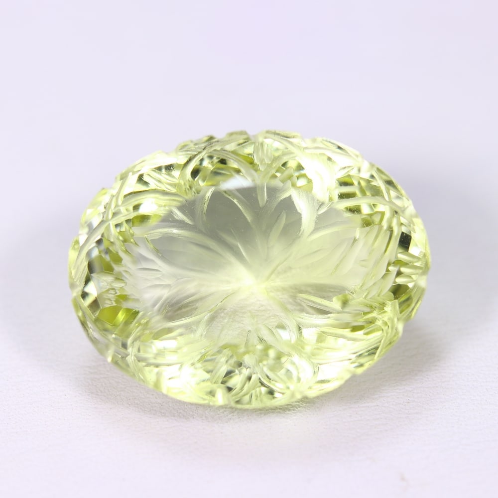 39.57Ct Lemon Carving Quartz - Polished Carving , 713E: Ksmith Heritage Auctioneers Subject: Natural Lemon Quartz Origin: Brazil Carat Weight: 39.57Ct Dimension: 24.4x18.8x13.4 mm Treatment: Untreated Type: Carving, Polished