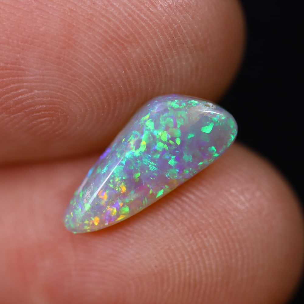 1.37Ct Australian Lightning Ridge Opal , 136E: Ksmith Heritage Auctioneers Subject: Natural Australian Opal Origin: Australia Carat Weight: 1.37Ct Dimension: 12.8x5.4x3.2 mm
