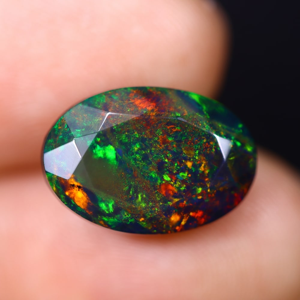 *4.95Ct Smoked Faceted Welo Opal Polished - Ethiopian Opal , 283C: Ksmith Heritage Auctioneers Subject: Natural Ethiopian Welo Opal Origin: Ethiopia Carat Weight: 4.95Ct Dimension: 15x10.3x6.9 mm Treatment: Smoked Type: Faceted, Polished<