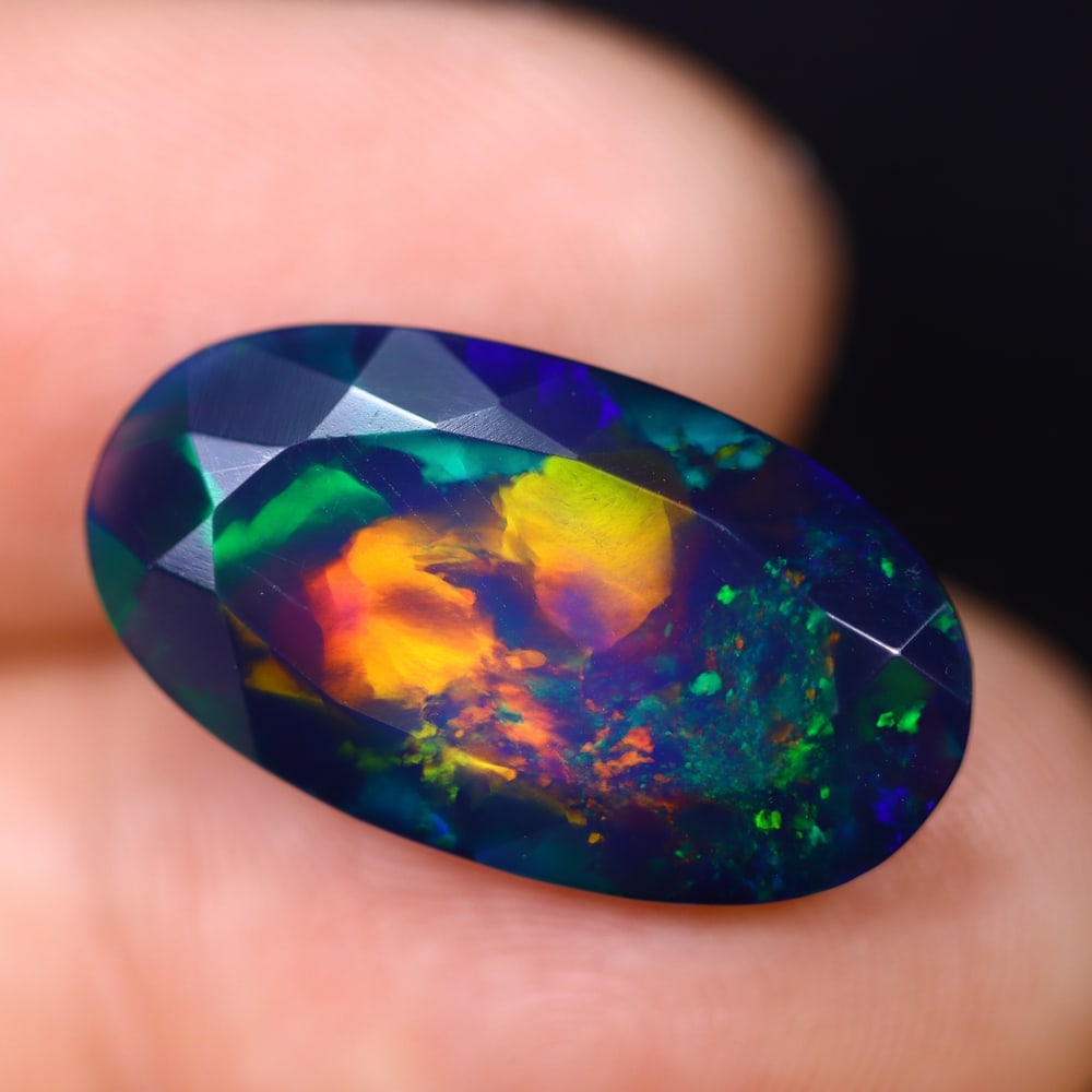 *5.18Ct Smoked Faceted Welo Opal Polished - Ethiopian Opal , 294C: Ksmith Heritage Auctioneers Subject: Natural Ethiopian Welo Opal Origin: Ethiopia Carat Weight: 4.94Ct Dimension: 19.8x11x5.4 mm Treatment: Smoked Type: Faceted, Polished<