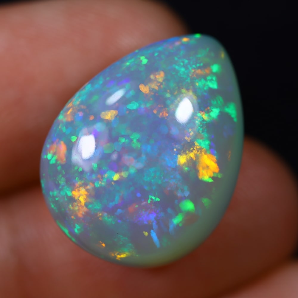 *14.14Ct Welo Opal Polished - Ethiopian Opal , 278E: Ksmith Heritage Auctioneers Subject: Natural Ethiopian Welo Opal Origin: Ethiopia Carat Weight: 14.14Ct Dimension: 19.5x15.1x10.1 mm Treatment: Natural Untreated Type: Cab