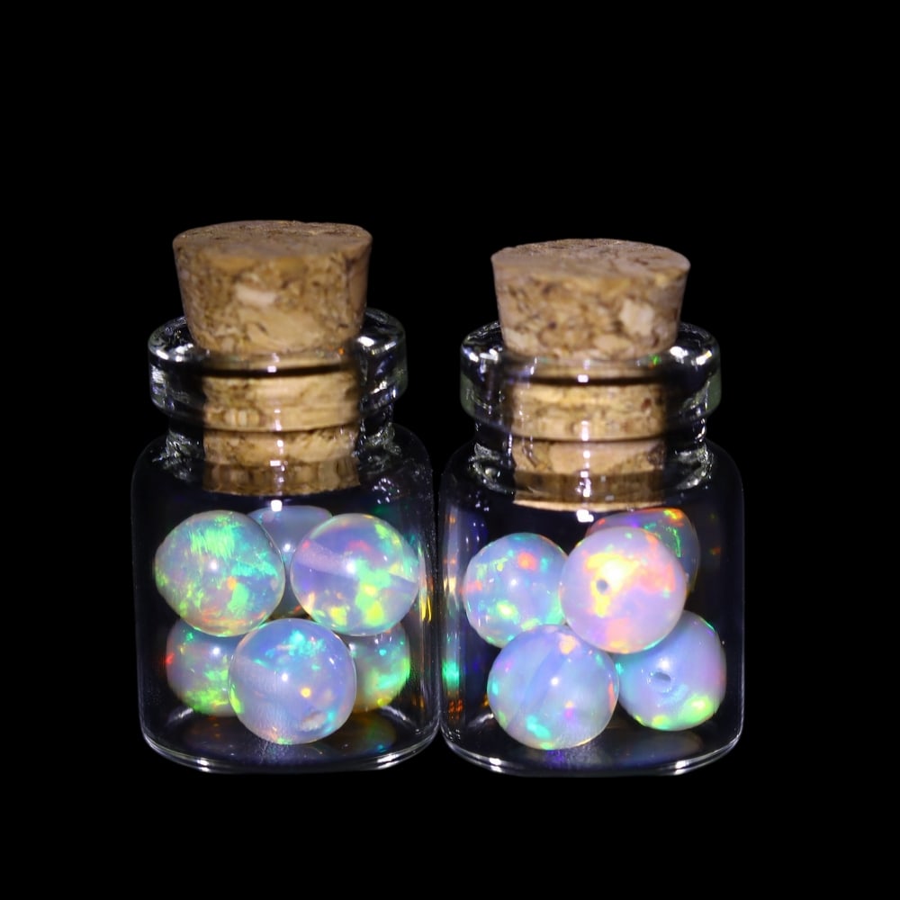 Twin Pack - 4.5mm Ethiopian Opal Ball in Display Jar - Bottle Size 1.5cm , 90C: Ksmith Heritage AuctioneersSubject: Natural Opal (with bottle) Origin: Ethiopia Treatment: Unheated