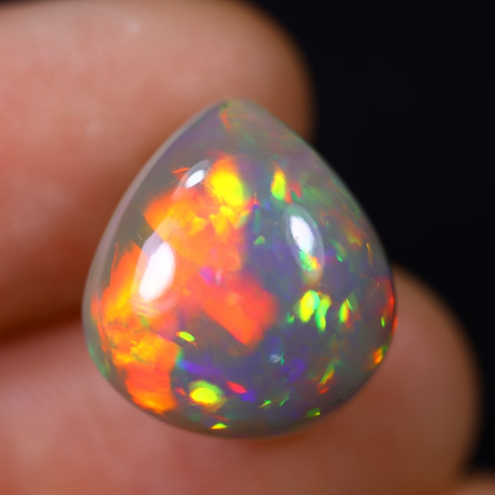 *10.44Ct Welo Opal Polished - Ethiopian Opal , 422E: Ksmith Heritage Auctioneers Subject: Natural Ethiopian Welo Opal Origin: Ethiopia Carat Weight: 10.44Ct Dimension: 15.2x13.8x10.1 mm Treatment: Natural Untreated Type: Cab