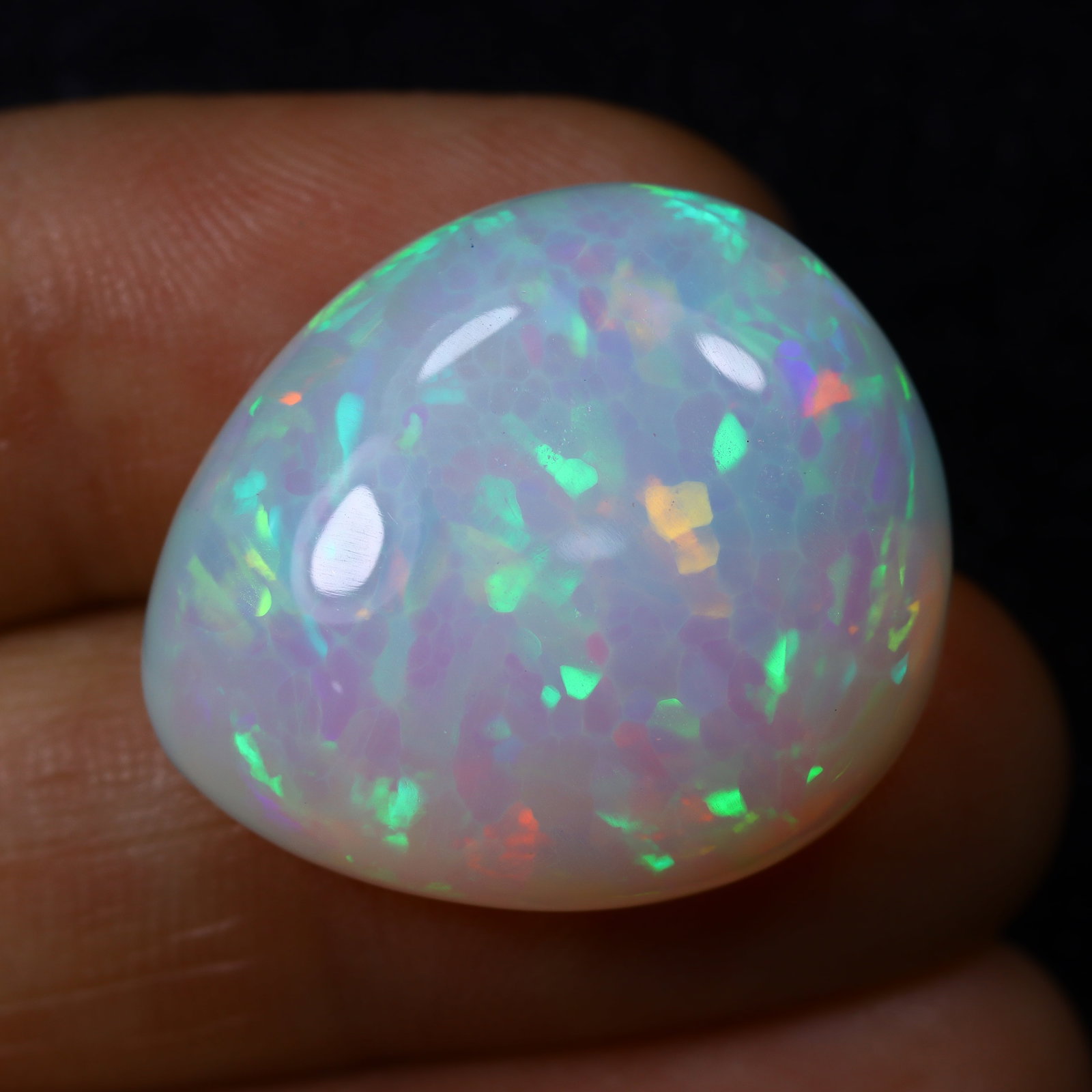 *24.41Ct Welo Opal Polished - Ethiopian Opal - Pear Cabochon , 200E: Ksmith Heritage Auctioneers Subject: Natural Ethiopian Welo Opal Origin: Ethiopia Carat Weight: 15.44Ct Dimension: 26.3 x 13.3 x 7 mm Treatment: Natural Untreated Shape: O