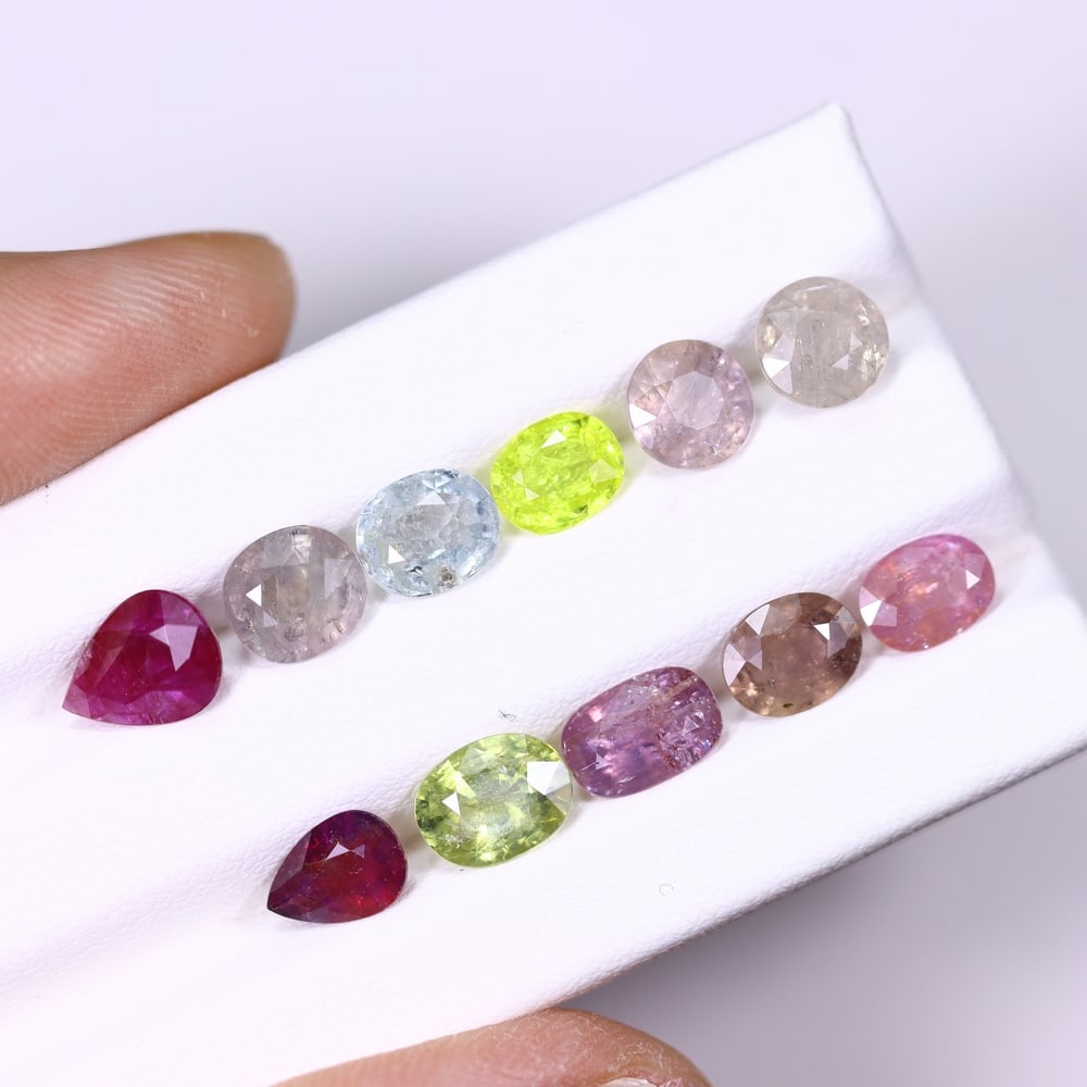 *12.84Ct Heated Fancy Sapphire Lot - Polished Faceted , 333C: Ksmith Heritage Auctioneers Subject: Natural Sapphire Carat Weight: 12.84Ct Dimension: 7.4x5.7x3.6 mm Treatment: Heated Type: Faceted, Polished
