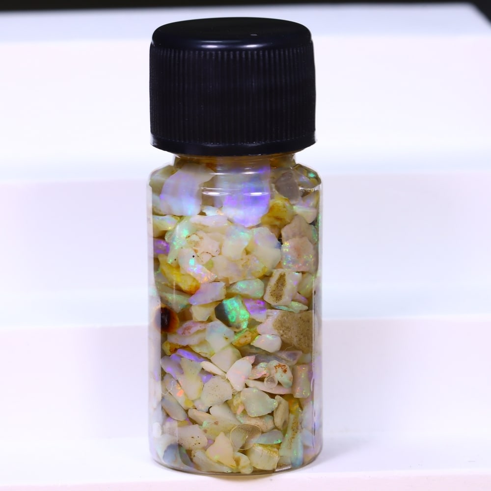 Australian Lightning Ridge Crystal Black Opal Rough Chip Jar (Good For Display), 1028B: Ksmith Heritage Auctioneers Subject: Natural Australian Opal Origin: Australia Quantity: 1 Jar as photo