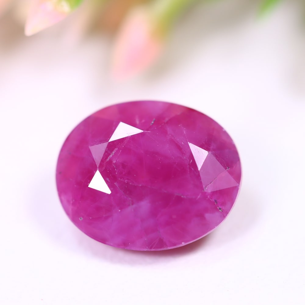 4.85Ct Red Ruby - Polished Faceted - Oval Faceted , 613E: Ksmith Heritage Auctioneers Subject: Natural Ruby Origin: Burma Carat Weight: 4.85Ct Dimension: 10.9 x 8.9 x 5.3 mm Treatment: Heated Shape: Oval Type: Faceted,