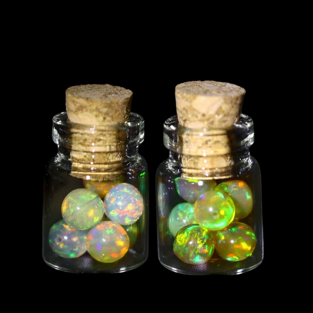 Twin Pack - 4.5mm Ethiopian Opal Ball in Display Jar - Bottle Size 1.5cm , 79C: Ksmith Heritage AuctioneersSubject: Natural Opal (with bottle) Origin: Ethiopia Treatment: Unheated