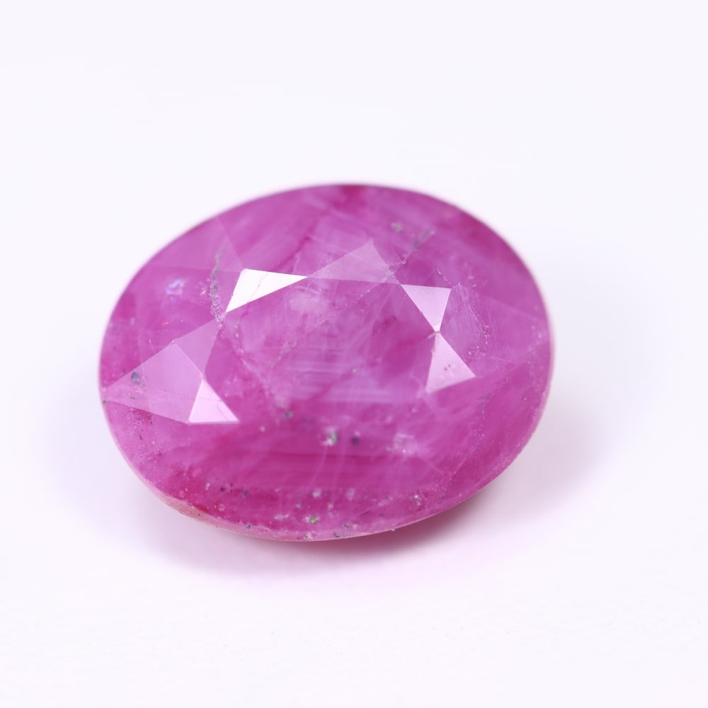 5.41Ct Red Ruby - Polished Faceted , 207E: Ksmith Heritage Auctioneers Subject: Natural Ruby Origin: Burma Carat Weight: 5.41Ct Dimension: 11.4x9.1x6 mm Treatment: Heated Type: Faceted, Polished