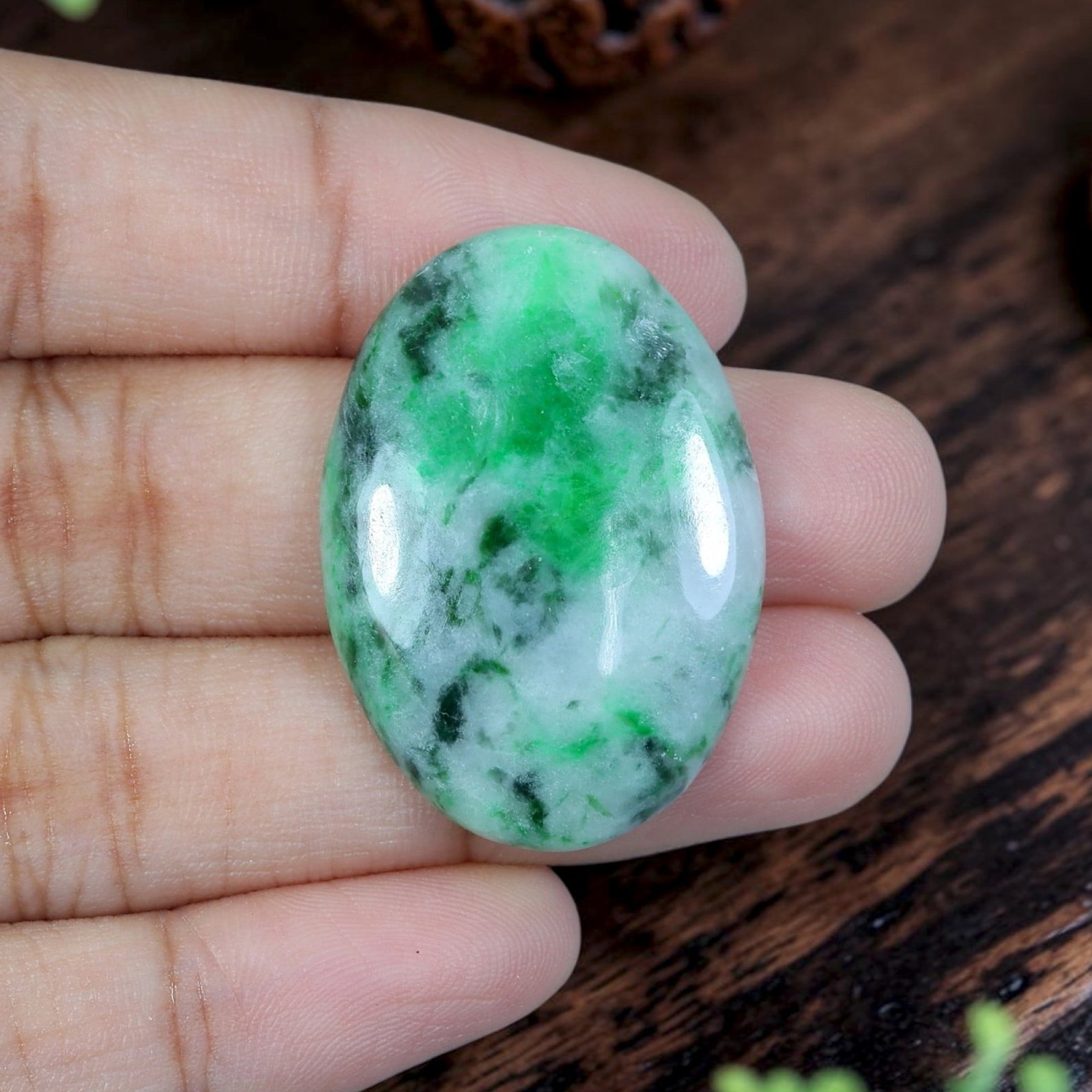 27.35ct Natural Burmese Type A Jadeite Jade Cabochon, 80EB: Polished from untreated natural Burmese Type A jadeite jade, this large oval cabochon features a sleek domed polished face and thin flat base designed for oversized custom pendant mounting. Bright mil