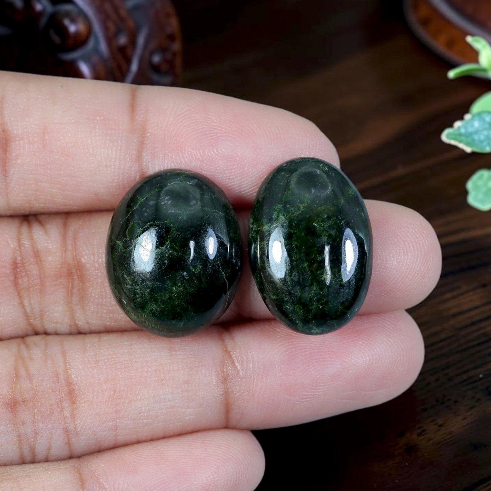 24.61ct Natural Burmese Type A Jadeite Jade Cabochon Pair, 16EC: Polished from untreated natural Burmese Type A jadeite jade, this matched pair of oval cabochons features thick domed high-gloss finish and flat bases engineered for custom earring setting. The stones