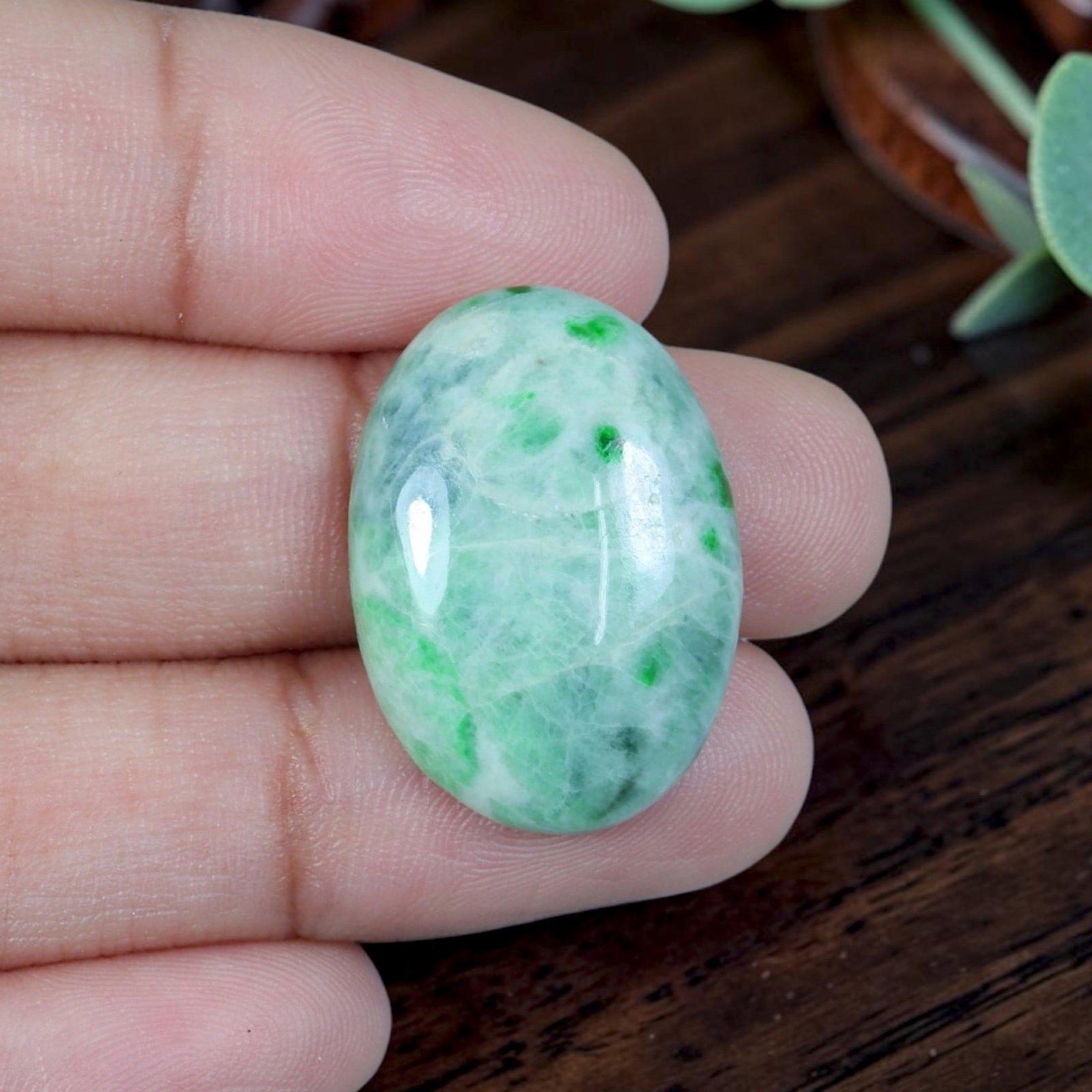 17.77ct Natural Burmese Type A Jadeite Jade Cabochon, 78EB: Polished from untreated natural Burmese Type A jadeite jade, this oval cabochon features smooth domed top and flat base made for ring or pendant jewelry setting. Pale translucent celadon base matrix i