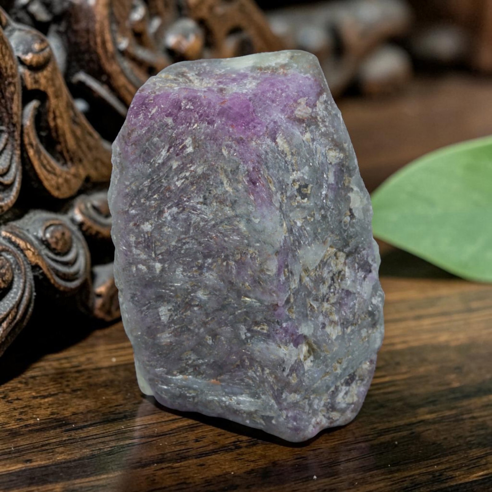45.25ct Natural Mauritania Ruby Rough (Unheated), 72XA: This unheated Mauritania ruby rough is a captivating natural crystal specimen, featuring vivid magenta-purple ruby formations embedded in a contrasting greyish matrix. The stone's rugged, unpolished s