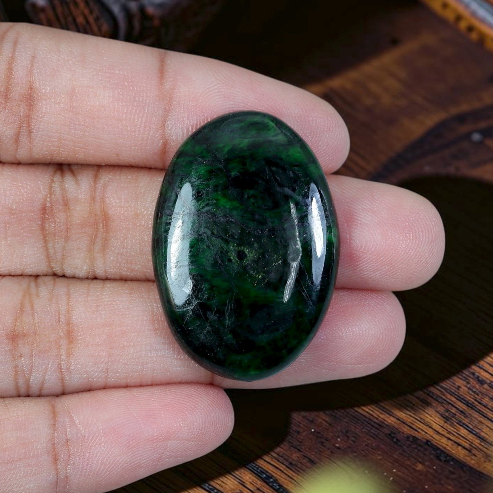 32.80ct Natural Burmese Type A Jadeite Jade Cabochon, 98EB: Polished from untreated natural Burmese Type A jadeite jade, this large plump domed oval cabochon features sleek high-gloss finish and flat base made for custom statement pendant mounting. Deep blacki