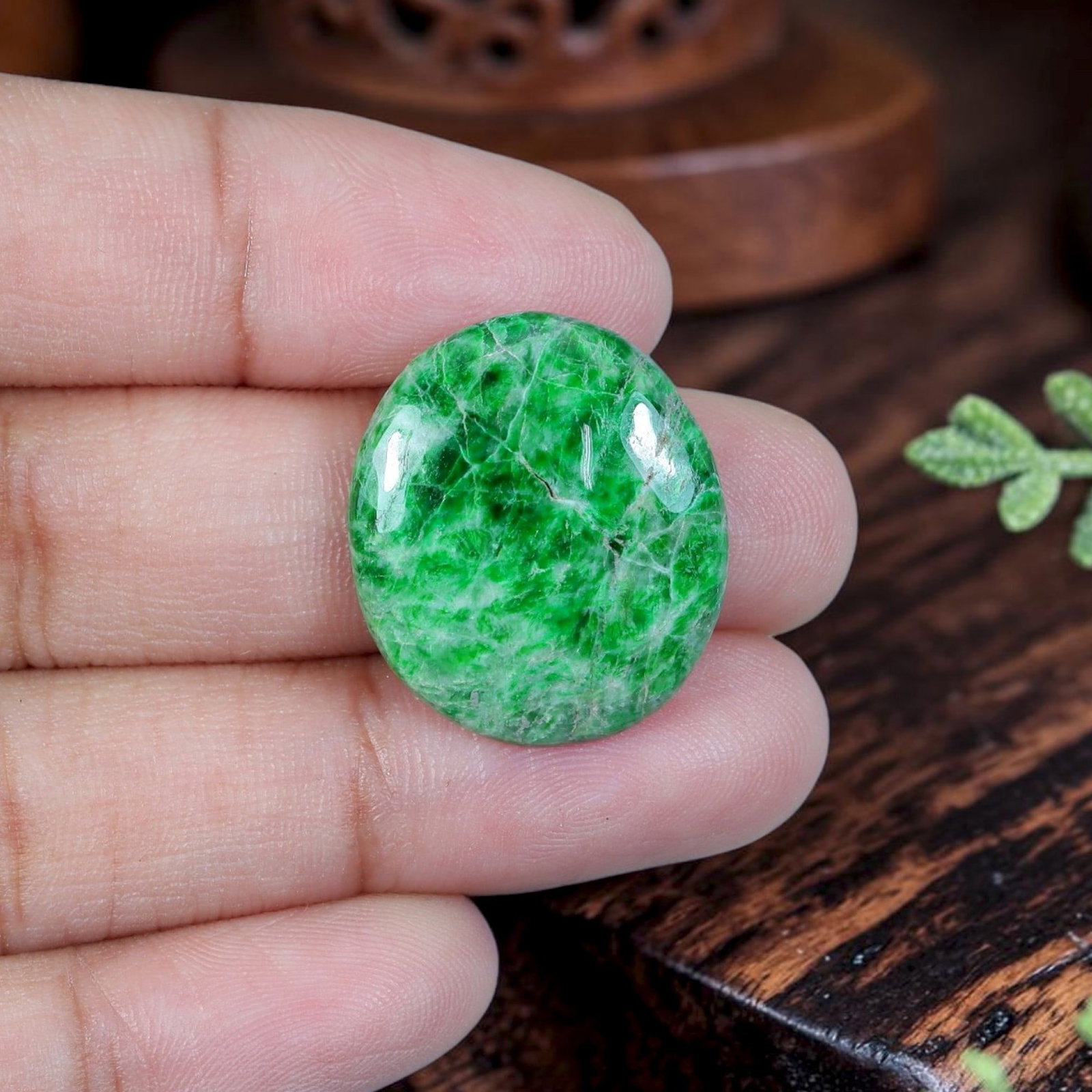 11.41ct Natural Burmese Type A Jadeite Jade Cabochon, 93EB: Polished from untreated natural Burmese Type A jadeite jade, this compact oval cabochon has a smoothly domed top paired with thin flat base suited for ring setting. Vivid saturated emerald green domin