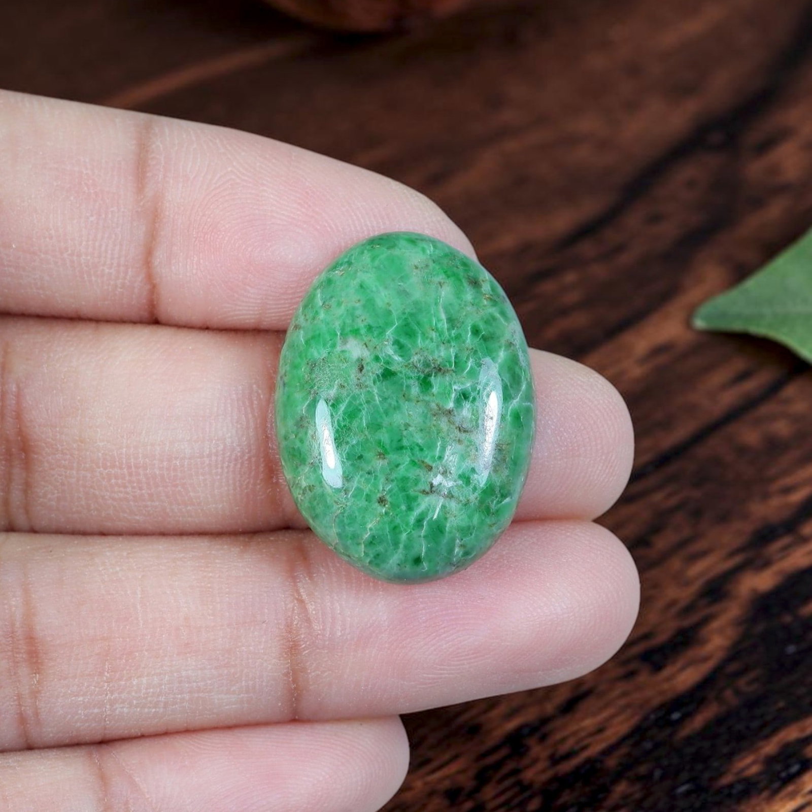 18.52ct Natural Burmese Type A Jadeite Jade Cabochon, 85EB: Polished from untreated natural Burmese Type A jadeite jade, this mid-sized oval cabochon features plump domed glossy surface and flat base ideal for ring or petite pendant setting. Rich saturated eme
