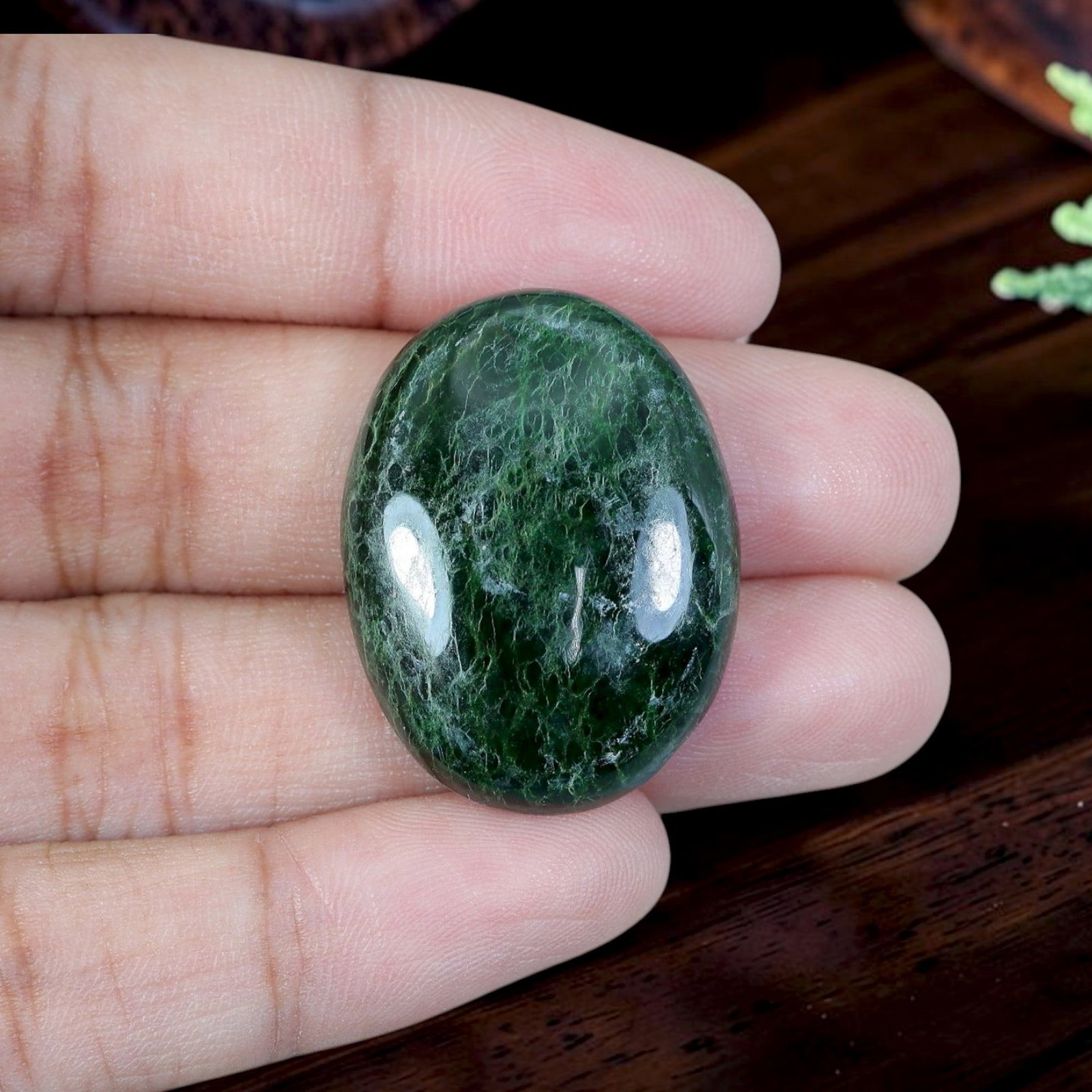 31.62ct Natural Burmese Type A Jadeite Jade Cabochon, 5EC: Polished from untreated natural Burmese Type A jadeite jade, this oversized thick domed oval cabochon features plump high-gloss surface and flat base for large statement pendant mounting. Rich deep fo