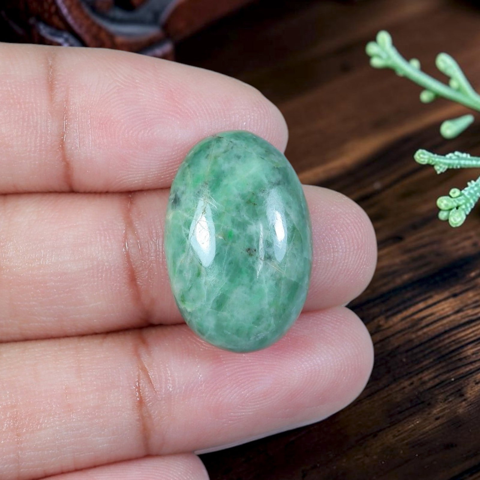 14.51ct Natural Burmese Type A Jadeite Jade Cabochon, 92EB: Crafted from untreated natural Burmese Type A jadeite jade, this compact oval cabochon features smoothly domed polished surface and flat base suited for ring or small pendant setting. Soft celadon gre